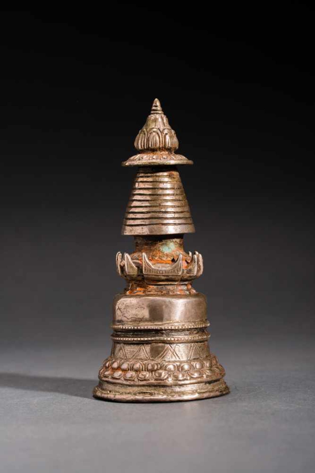 VOTIVE STUPASilver-plated bronzeTibet, 19th centuryOn the whole, this handy chaitya has a conical