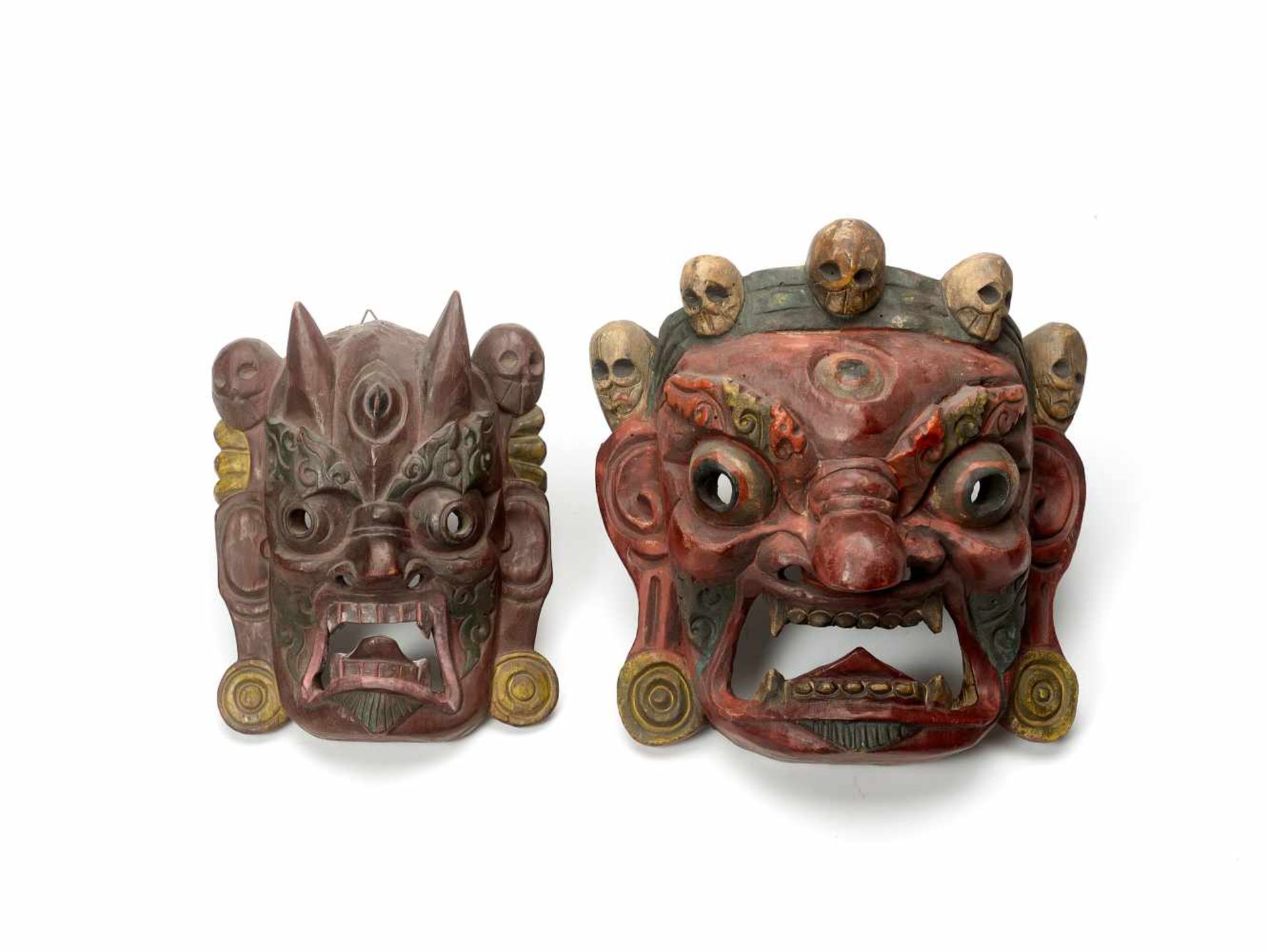 TWO TIBETAN MASKS – 1900 - 1930Polychrome colors on woodTibet, 1900-1930The larger is a