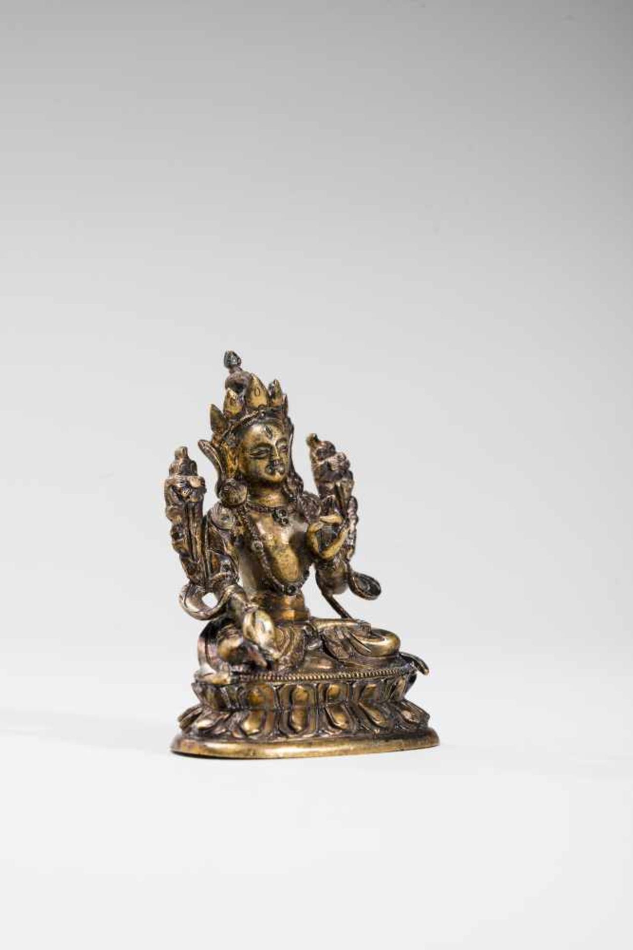 A SINO-TIBETAN GILT MINIATURE BRONZE OF SITATARA, 18TH CENTURYGilt bronzeTibet, 18th centurySitatara - Image 3 of 5