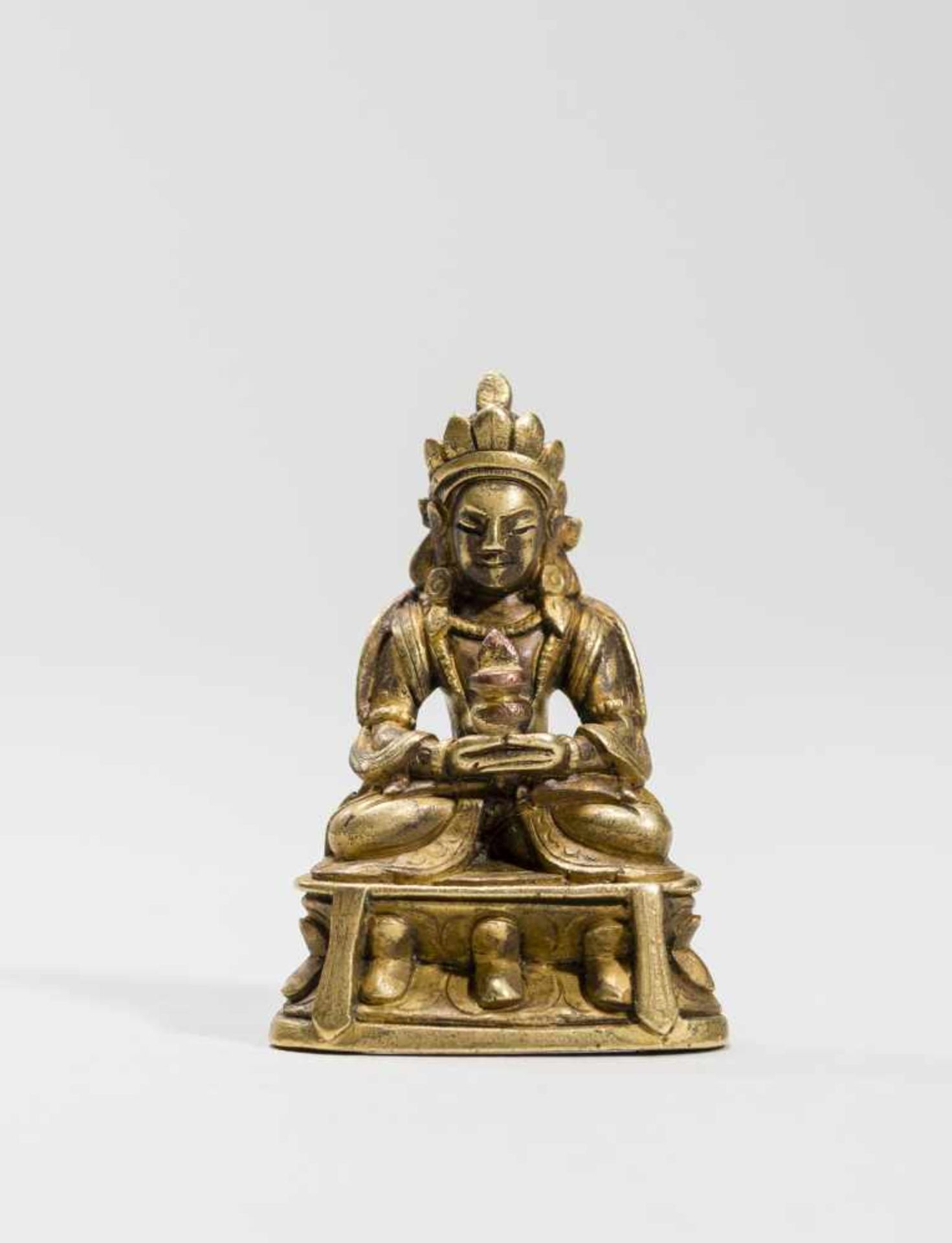 A SINO-TIBETAN FIRE-GILT MINIATURE BRONZE OF BUDDHA AMITAYUS, 18TH-19TH CENTURYFire-gilt