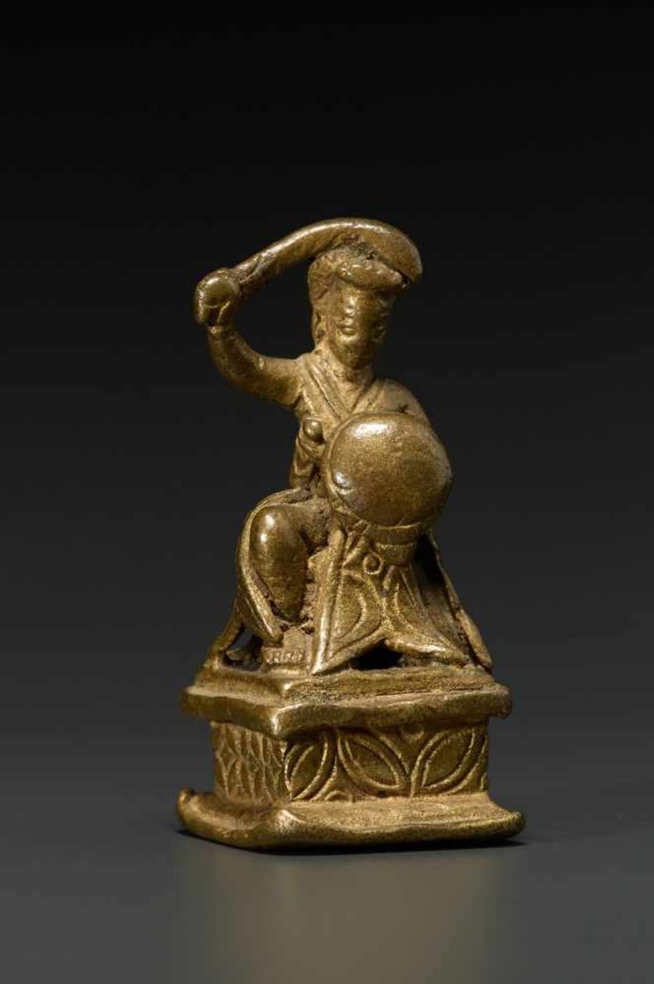 SKANDA WITH SWORD AND SHIELDBronze, Indiaapprox. 19th cent.A small bronze representation of Skanda