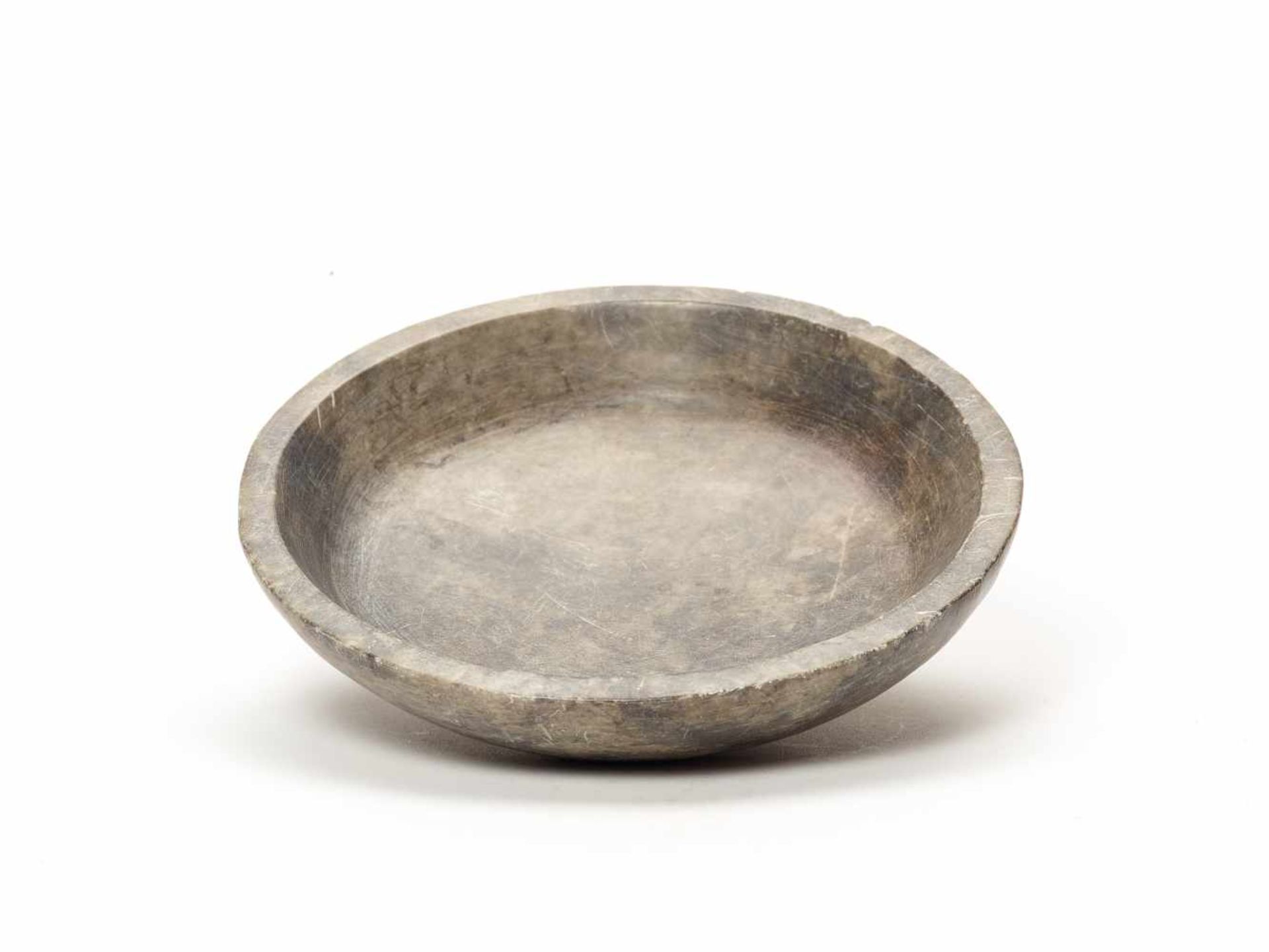 STONE BOWL – CHAVIN CULTURE, PERU, C. 500 BCStoneChavin culture, Peru, c. 500 BCA grayish short bowl