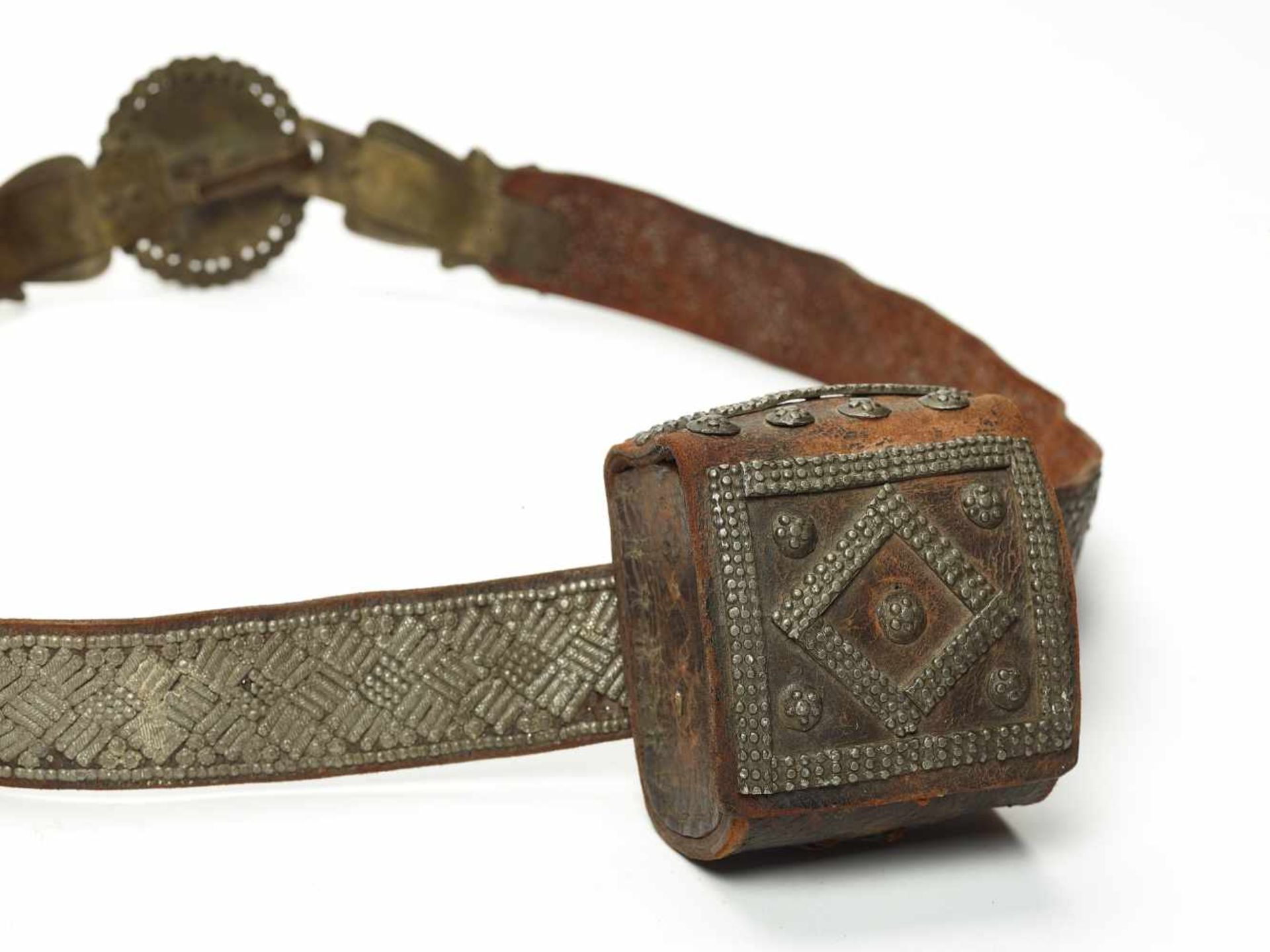 A BELT WITH BUCKLE AND VESSEL, C. 19TH CENTURYBrass, silver-plated, leatherNorthern India or - Image 2 of 5