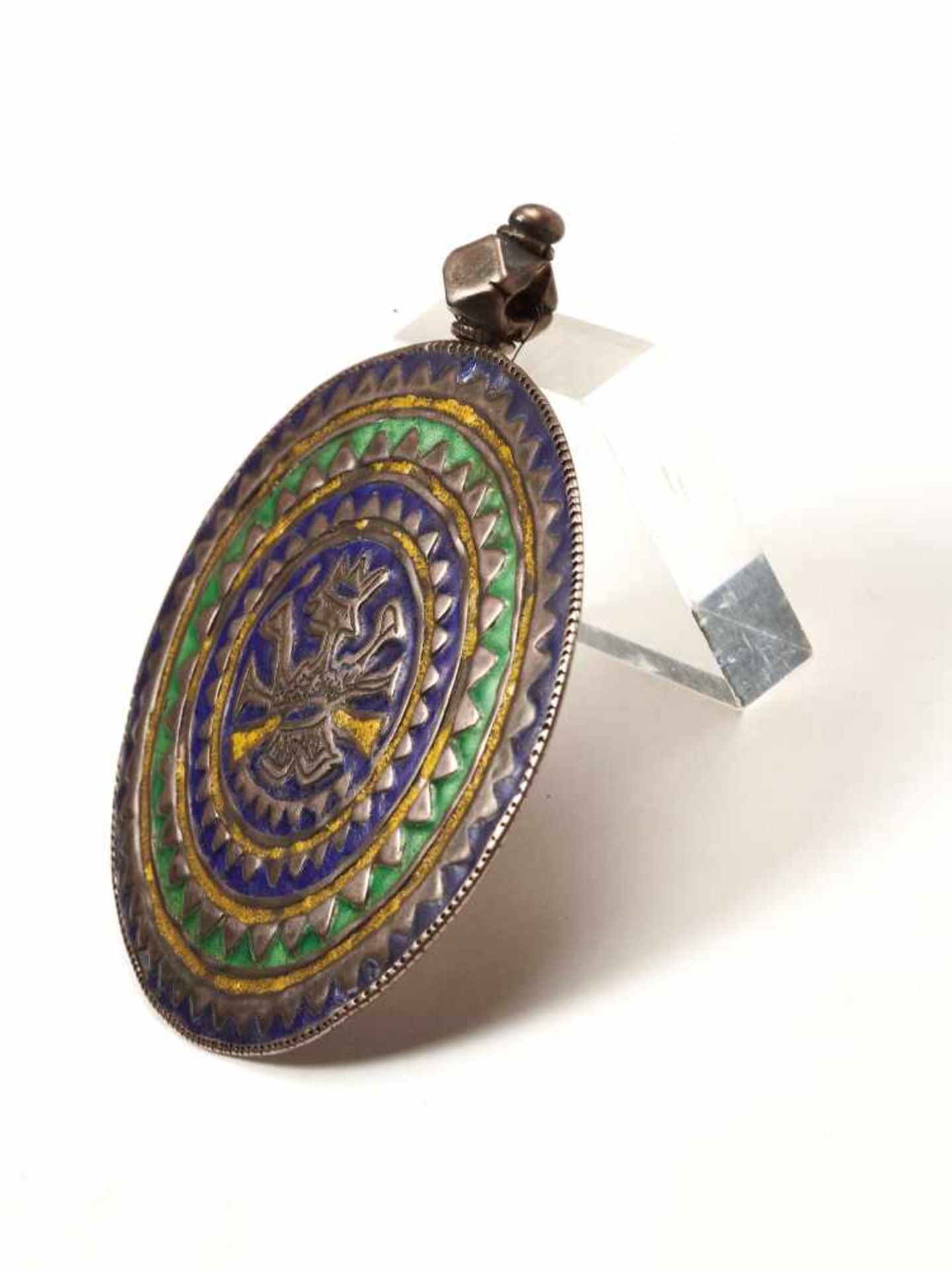 AN INDIAN SILVER AND ENAMEL AMULET, 19TH CENTURYSilver, enamelIndia, 19th centuryThis silver and - Image 2 of 3