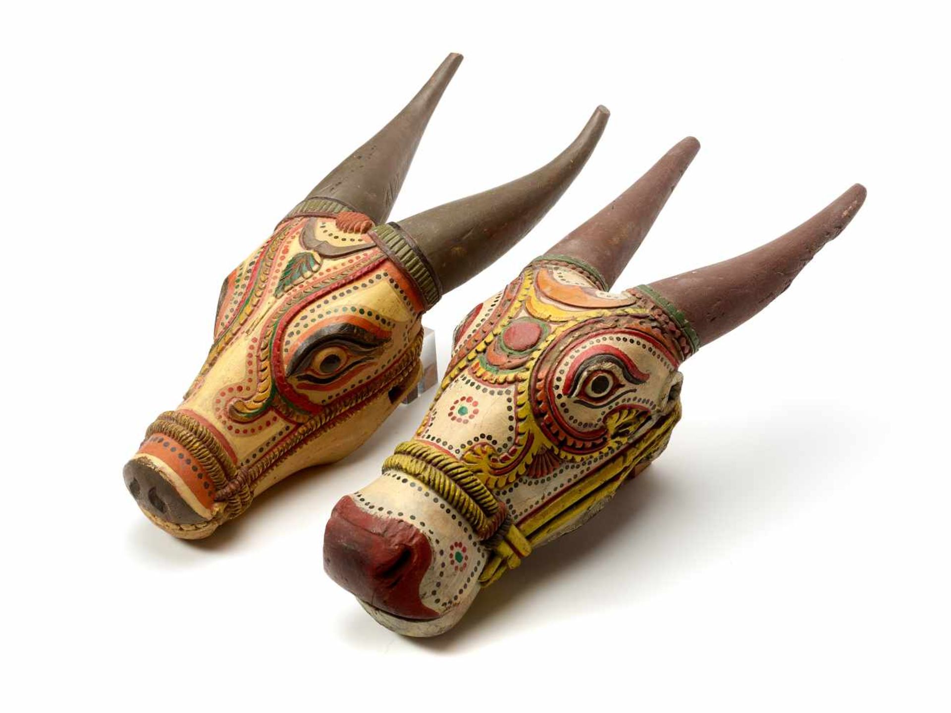 A PAIR OF PAINTED NANDI HEADS – INDIA 19th / 20th CENTURYHand carved wood with hand paintingIndia,