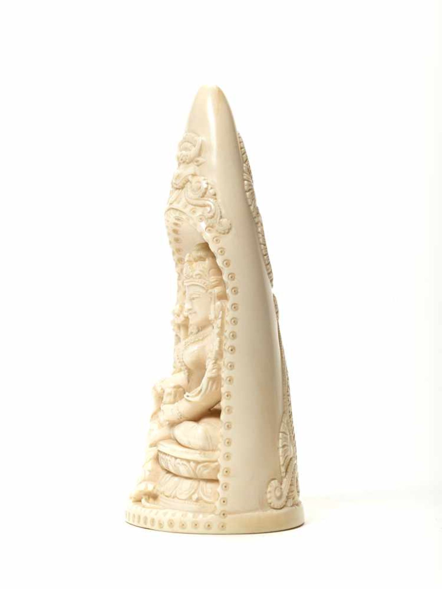 AN INDIAN IVORY TUSK CARVING OF PADMAPANI, 20th CENTURYIvoryIndia, 20th centuryThe ivory carved from - Image 3 of 5