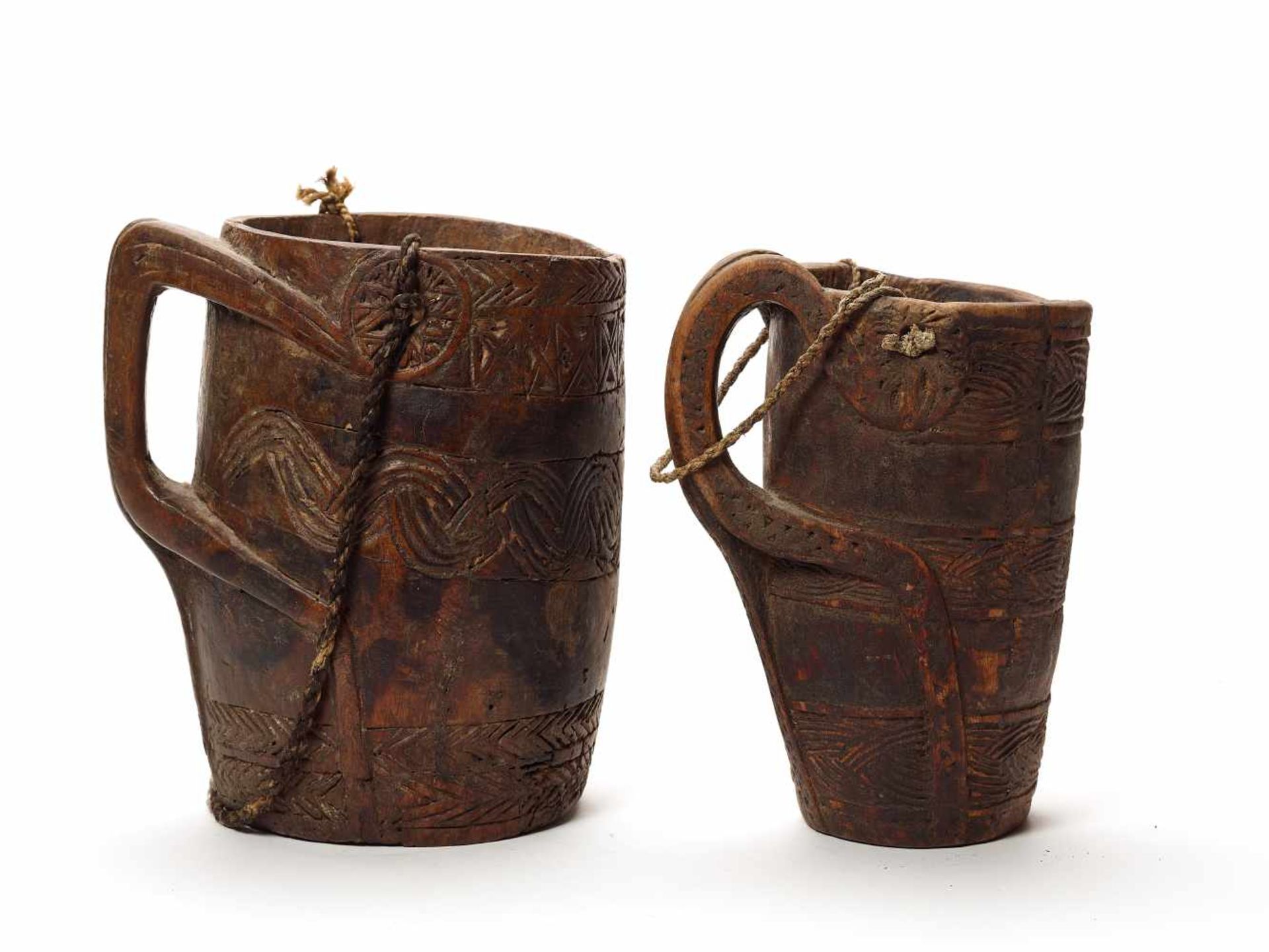 TWO INDIAN WOOD VESSELS WITH HANDLES, c. 18TH-19TH CENTURYWood, stringIndia, c. 18th-19th centuryTwo