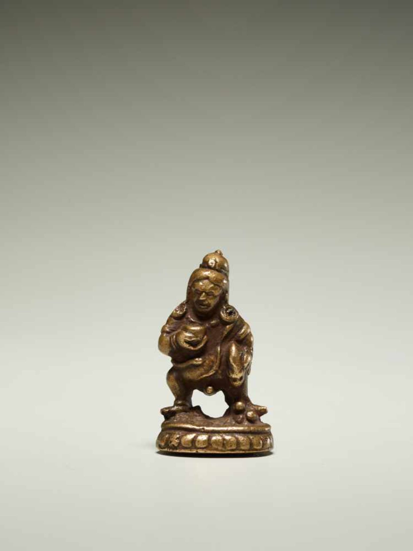 THE DEITY OF WEALTH KUBERAYellow bronzeIndia, approx. 19th cent.A miniature amulet formed as the god