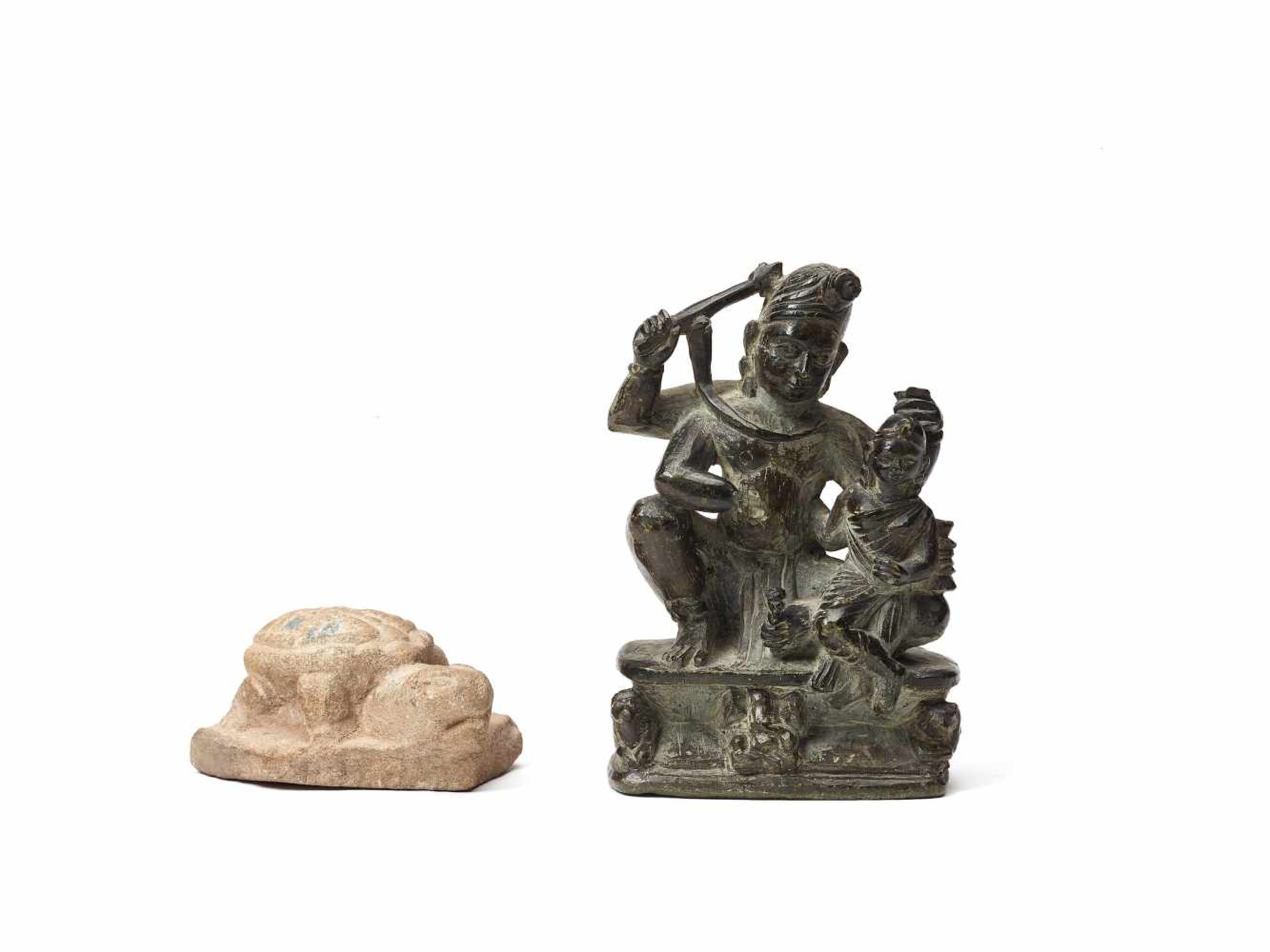 TWO STONE FIGURESStone carving, SandstoneIndia, 19th century; Probably Southeast Asia, c. 18th-