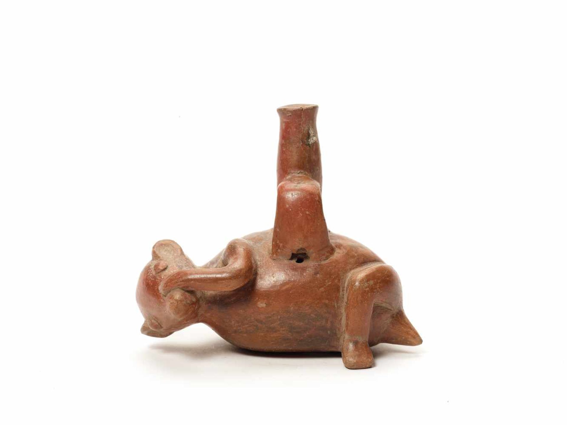 A COATIMUNDI-SHAPED WHISTLE - CHORRERA CULTURE, ECUADOR, C. 500 BC Fired clayChorrera culture,