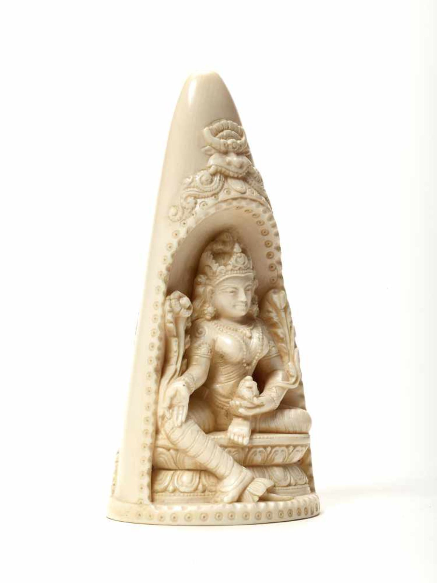 AN INDIAN IVORY TUSK CARVING OF PADMAPANI, 20th CENTURYIvoryIndia, 20th centuryThe ivory carved from - Image 5 of 5