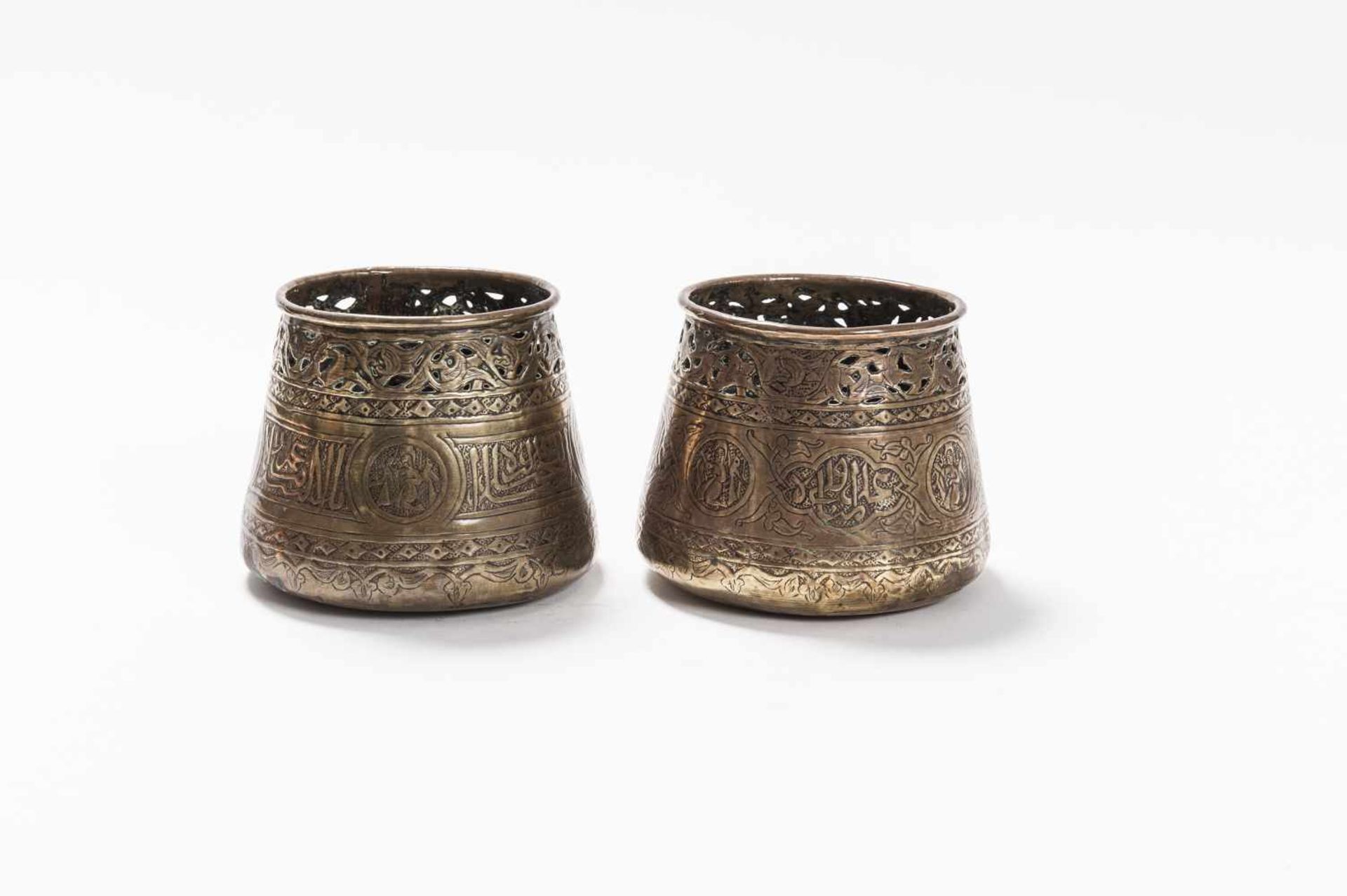 TWO DECORATIVE INDO-PERSIAN REPOUSSÉ COPPER CUPS, 19TH CENTURYRepoussé copperIndo-Persian, 19th