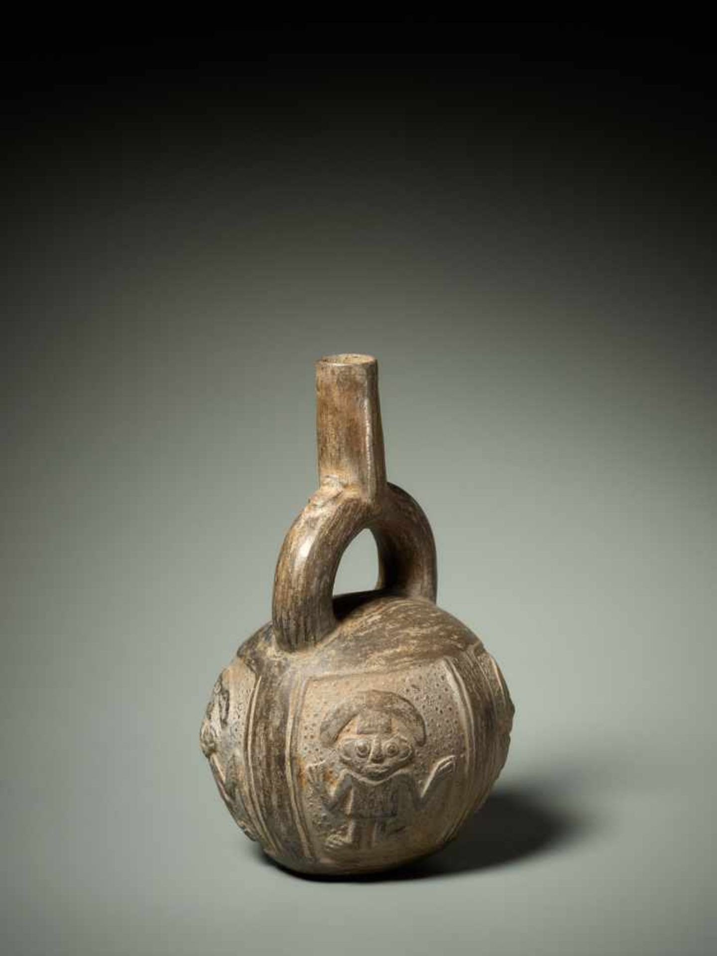 STIRRUP VESSEL WITH RELIEF DECORATION – CHIMU CULTURE, PERU, C. 1000-1400 ADBlack fired clayChimu - Image 3 of 5