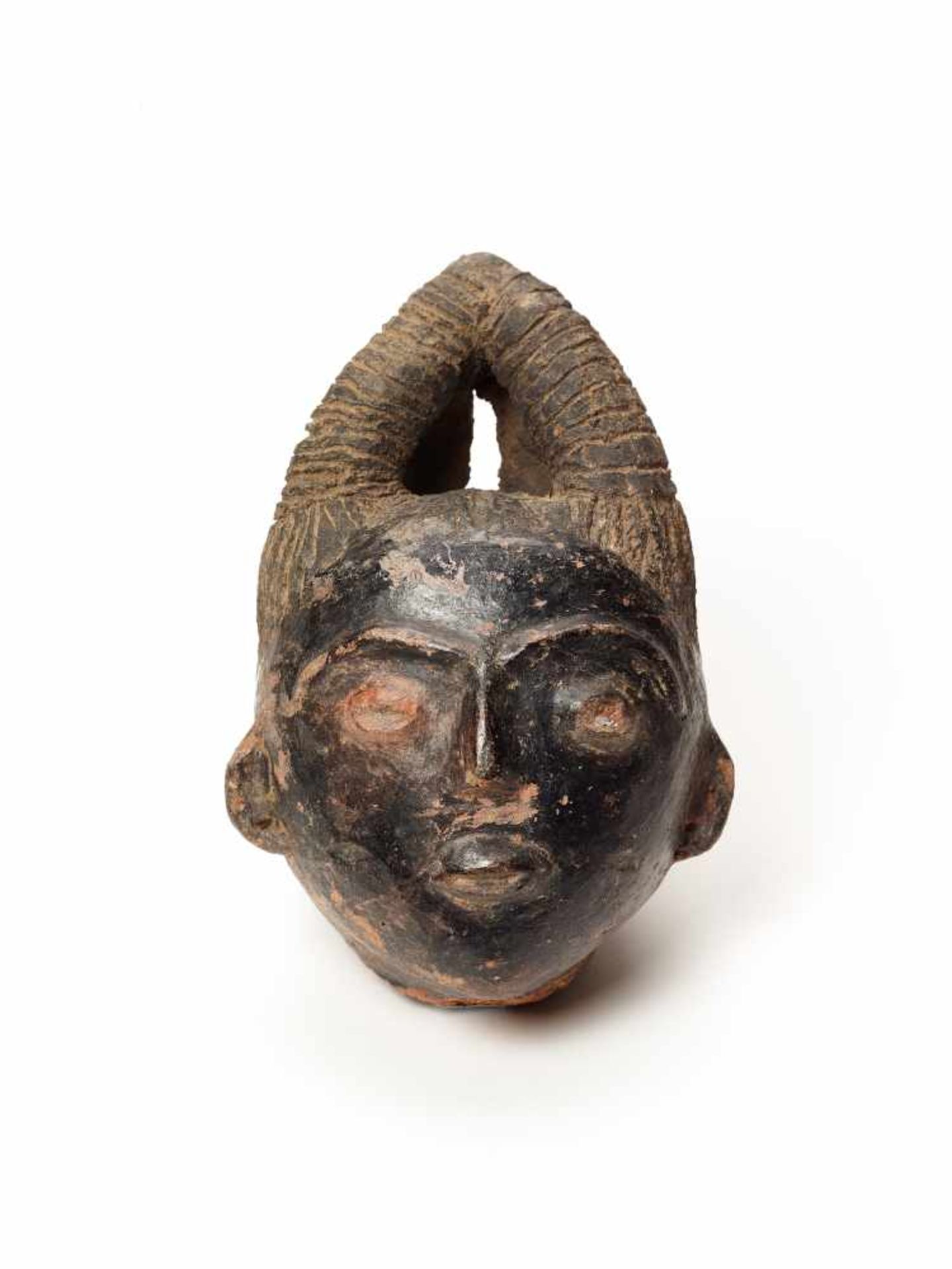 MEMORIAL HEAD – ASHANTI/ AKAN, GHANA, 18th – 19th CENTURY Terracotta with black glaze Ashanti/ Akan,