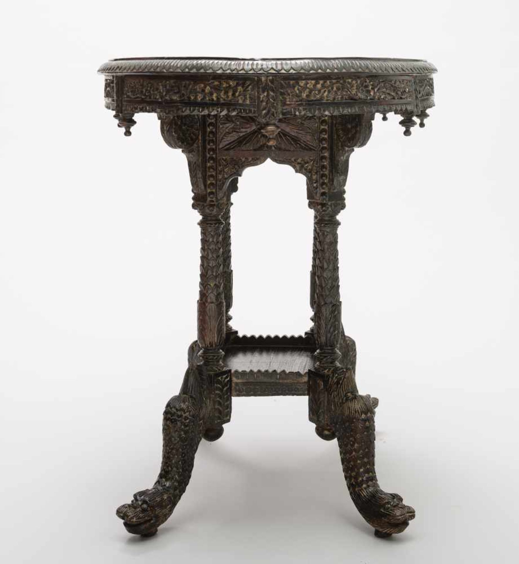TABLE WITH RICH CARVED DECORRosewood India, 19th cent. Oval round surface with a wide rim - Image 7 of 8