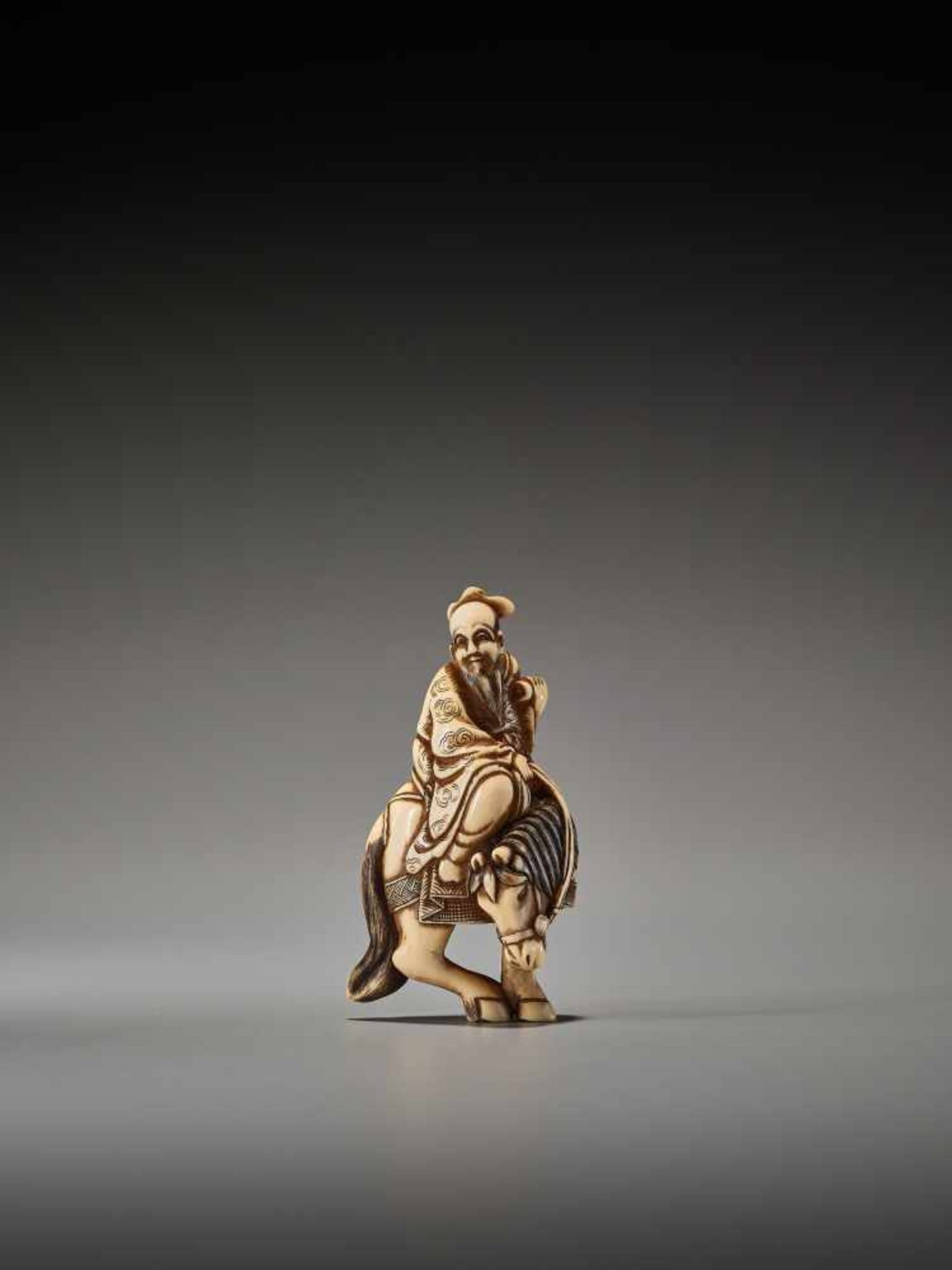 AN IVORY NETSUKE OF A TAOIST IMMORTAL ON HORSEBACK SIGNED MASANAOSigned Masanao, ivory netsukeJapan,