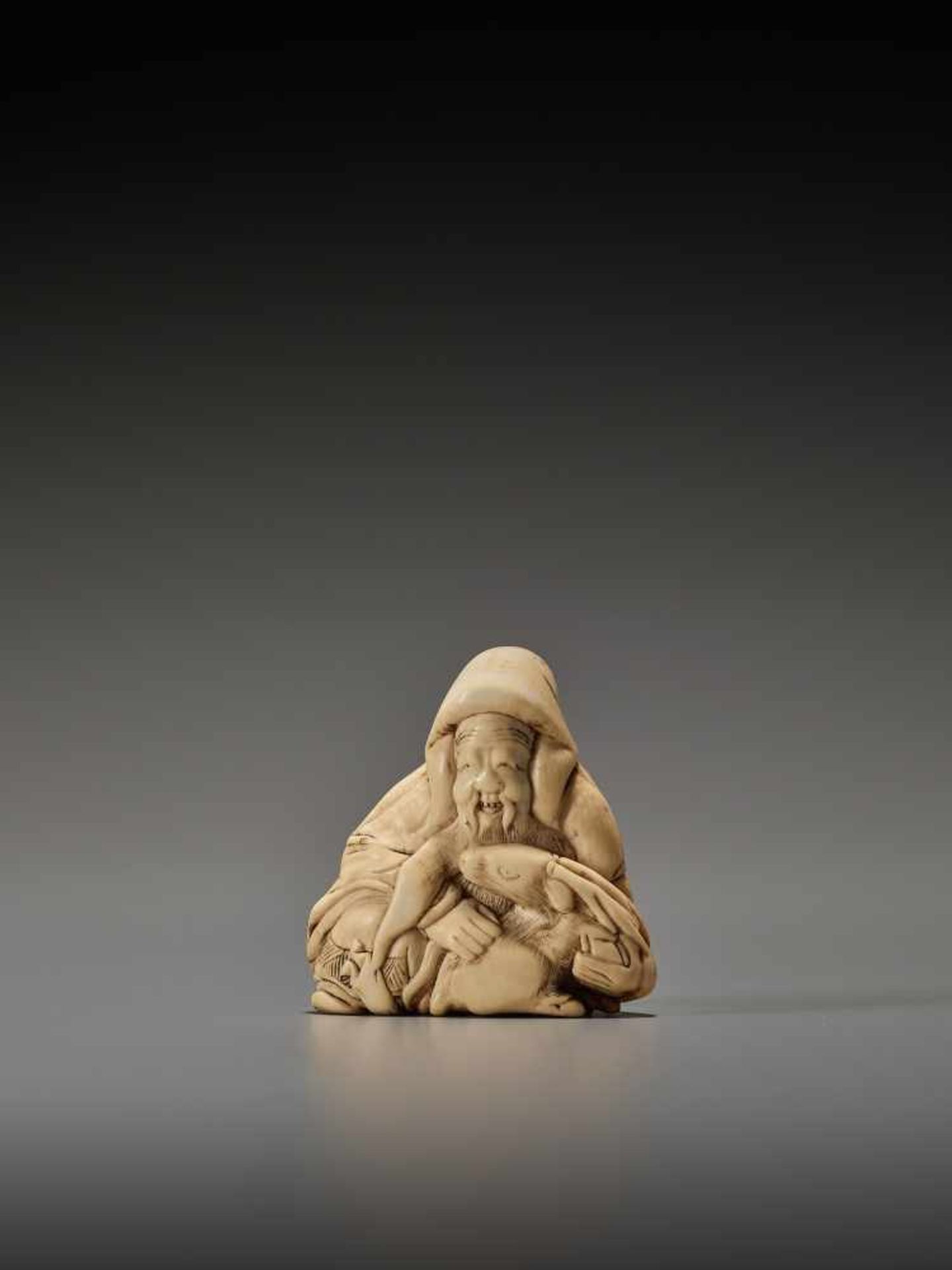 AN IVORY NETSUKE OF JUROJIN WITH STAGUnsigned, ivory netsukeJapan, 19th century, Edo period (1615- - Image 2 of 7