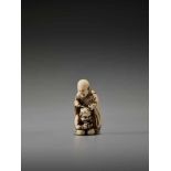 AN IVORY NETSUKE OF A MONK AND REPENTANT ONIUnsigned, Tomochika school, ivory netsukeJapan, mid to