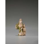 A TOKYO-SCHOOL IVORY NETSUKE OF AN OIRAN WITH A KAMURO BY GYOKUZANBy Gyokuzan, ivory netsuke with