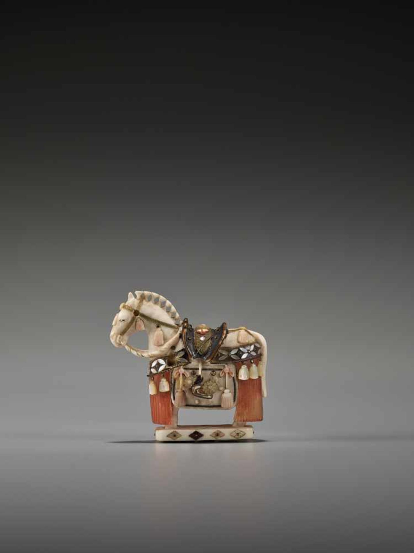 A SHIBAYAMA STYLE INLAID IVORY NETSUKE OF A CAPARISONED HORSE BY KAZUAKIBy Kazuaki, ivory netsuke - Image 4 of 8