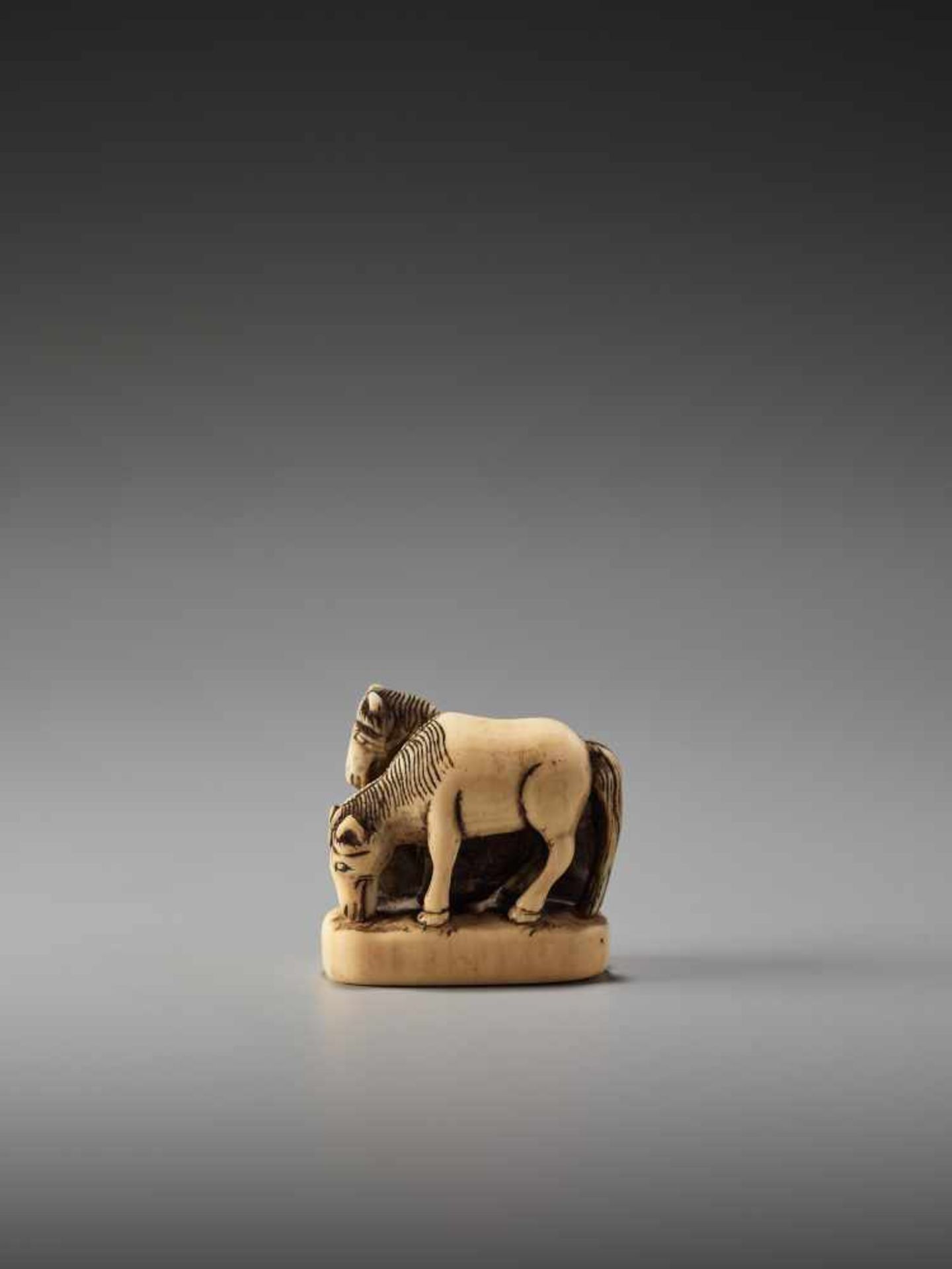 AN IVORY NETSUKE OF TWO HORSES ON A BASEUnsigned, ivory netsukeJapan, early 19th century, Edo period - Image 3 of 9