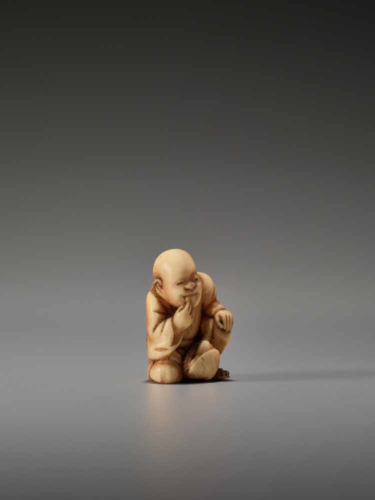 AN IVORY SHUNGA NETSUKE OF A MAN TASTING A CLAM BY THE TOMOCHIKA SCHOOLBy Tomochika, ivory shunga - Image 6 of 8