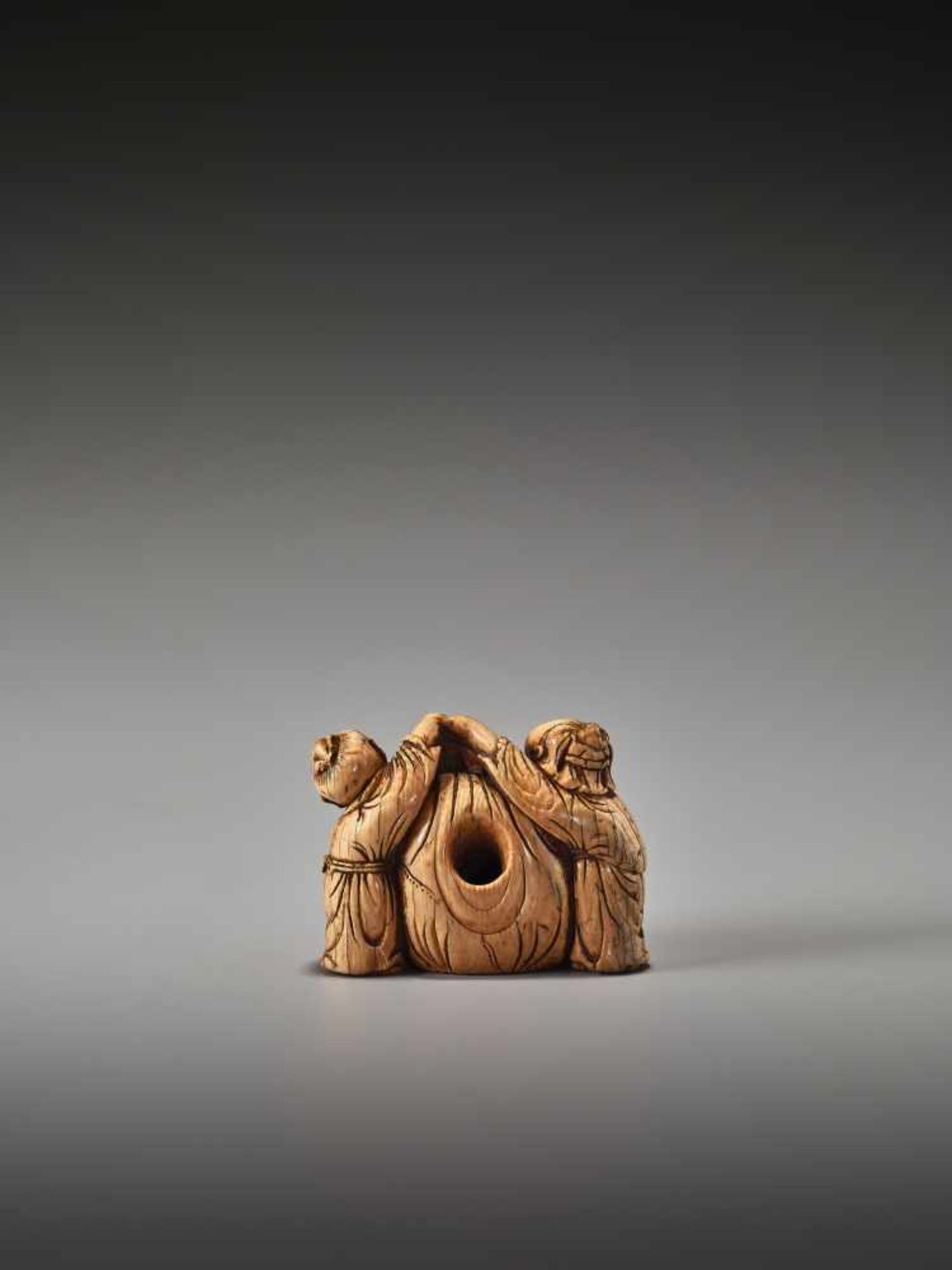 A VERY RARE 17TH CENTURY IVORY NETSUKE OF TWO CHINESE BOYS WITH HOTEI’S SACKUnsigned, ivory - Image 4 of 6