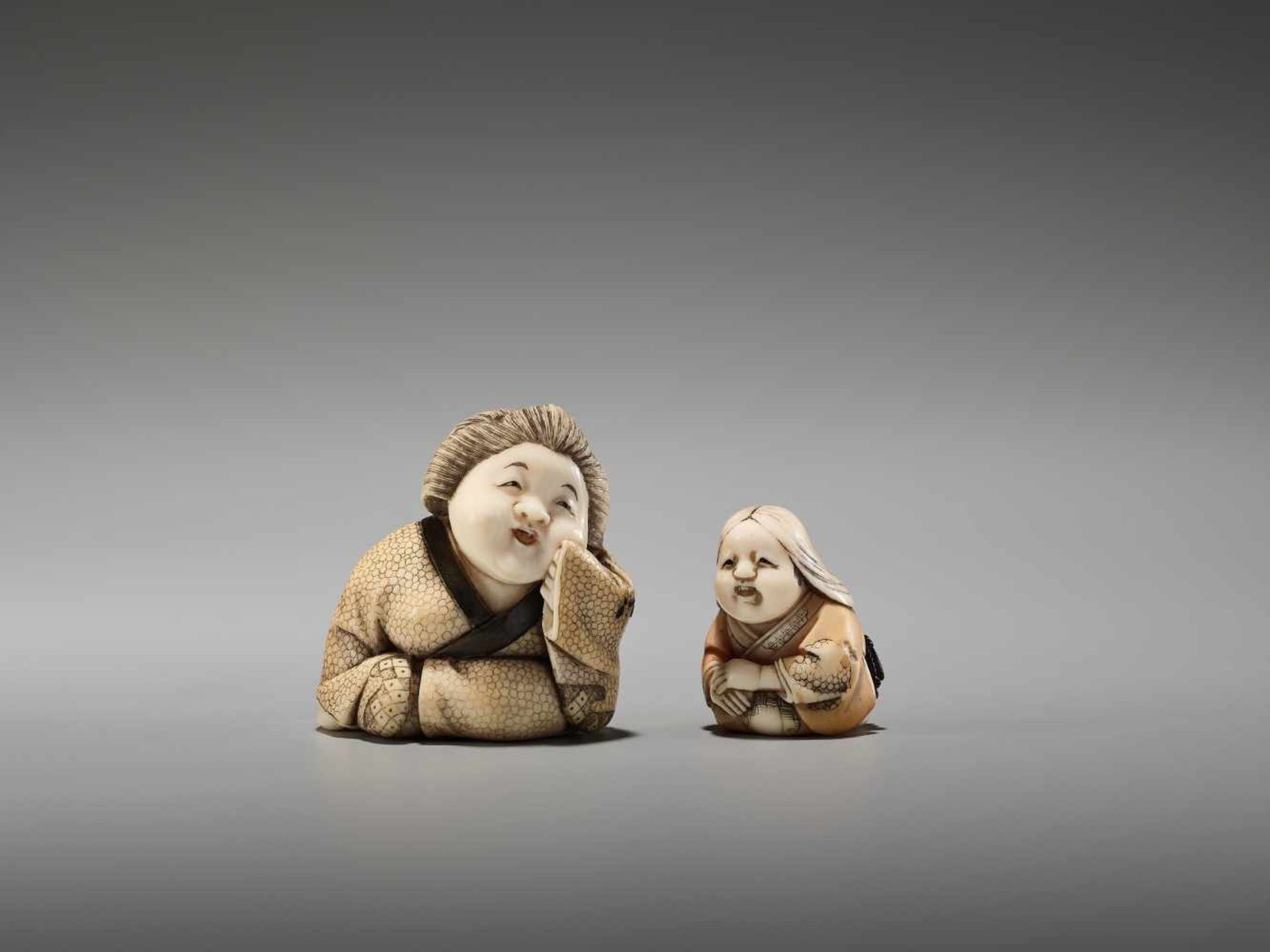 TWO IVORY TOKYO-SCHOOL NETSUKE DEPICTING OKAME BY YASUMASA AND YASUAKIBy Yasuaki (Homei) and