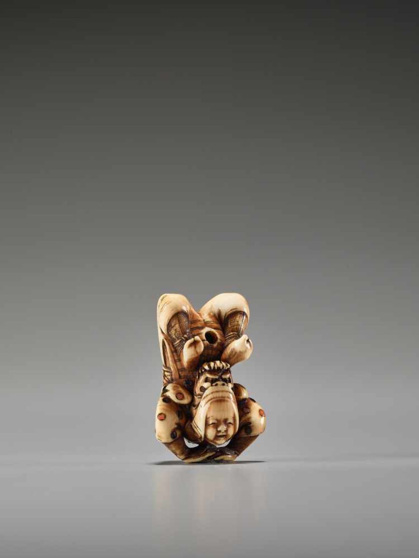 A FINE INLAID IVORY NETSUKE DEPICTING AN ACROBATUnsigned, ivory netsuke with inlaysJapan, probably - Image 6 of 7