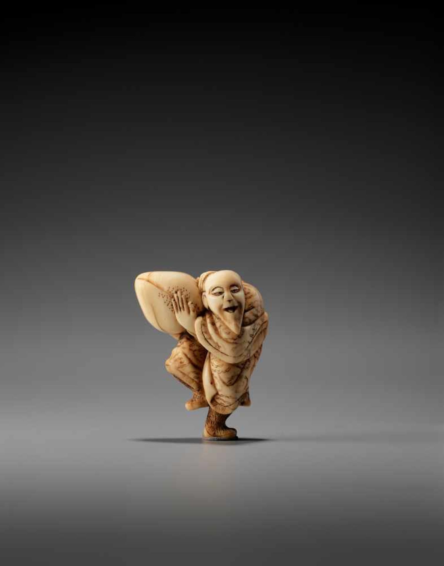 AN IVORY NETSUKE OF THE SENNIN TOBOSAKU BY MASAMORIBy Masamori, ivory netsukeJapan, 19th century,