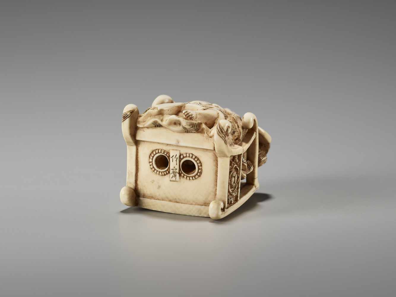 AN UNUSUAL IVORY NETSUKE OF HOTEI ON A THRONE BY CHIKUSAIBy Chikusai, ivory netsukeJapan, mid-19th - Image 7 of 9