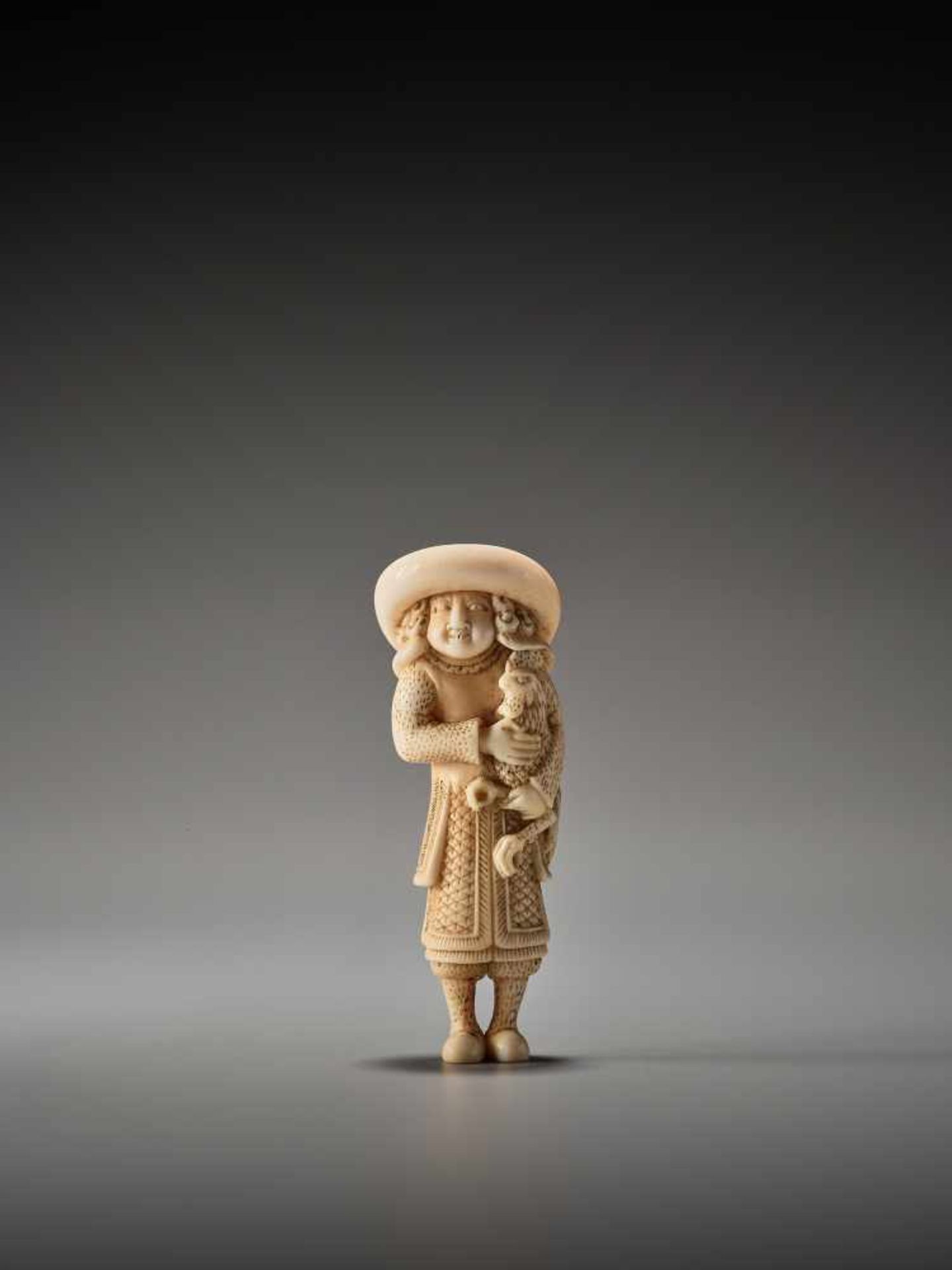 A RARE MARINE IVORY NETSUKE OF A DUTCHMAN WITH A COCKERELUnsigned, marine ivory netsukeJapan,