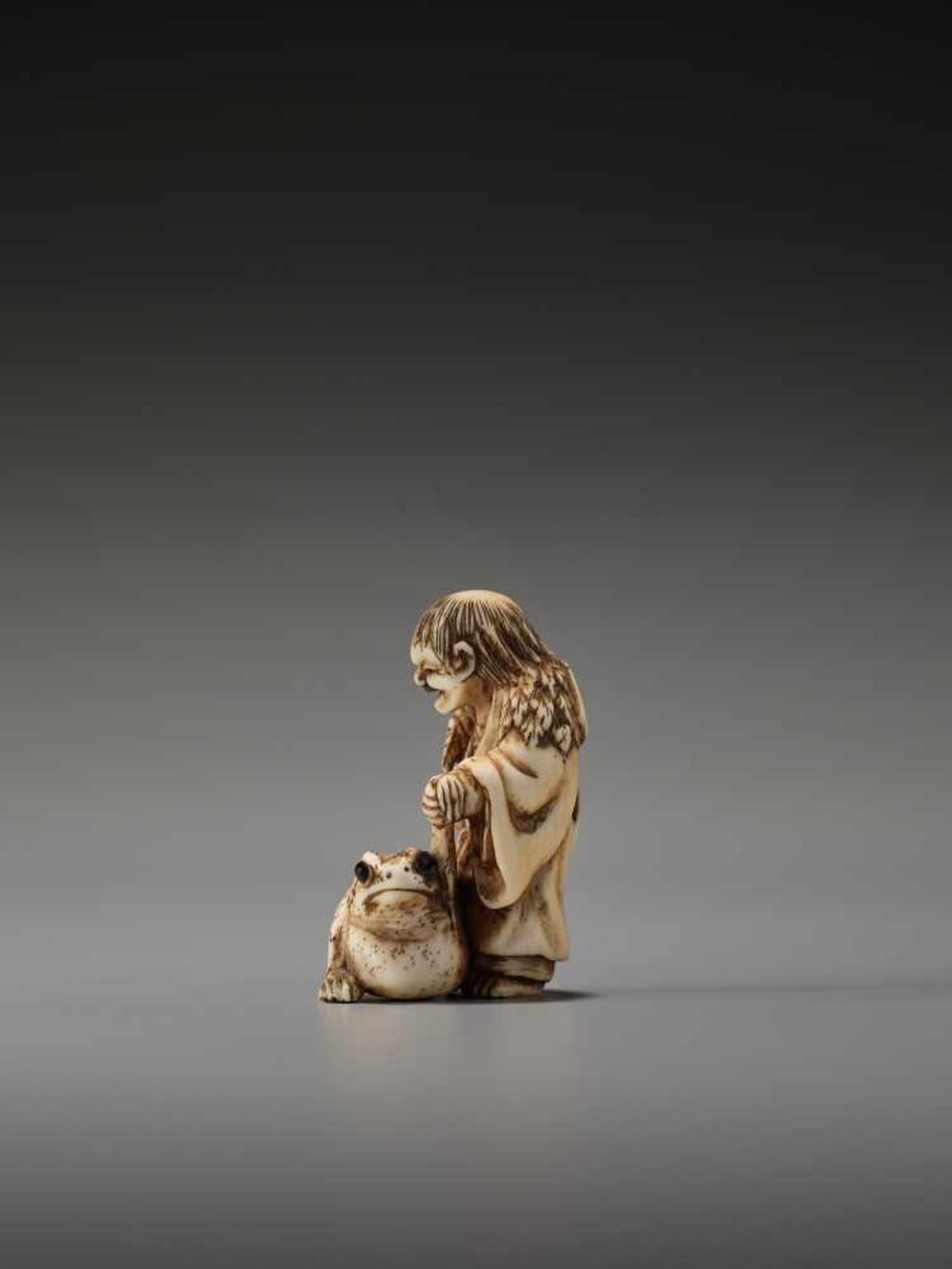 AN IVORY NETSUKE OF GAMA SENNIN WITH LARGE TOADUnsigned, ivory netsukeJapan, 19th century, Edo - Image 3 of 6