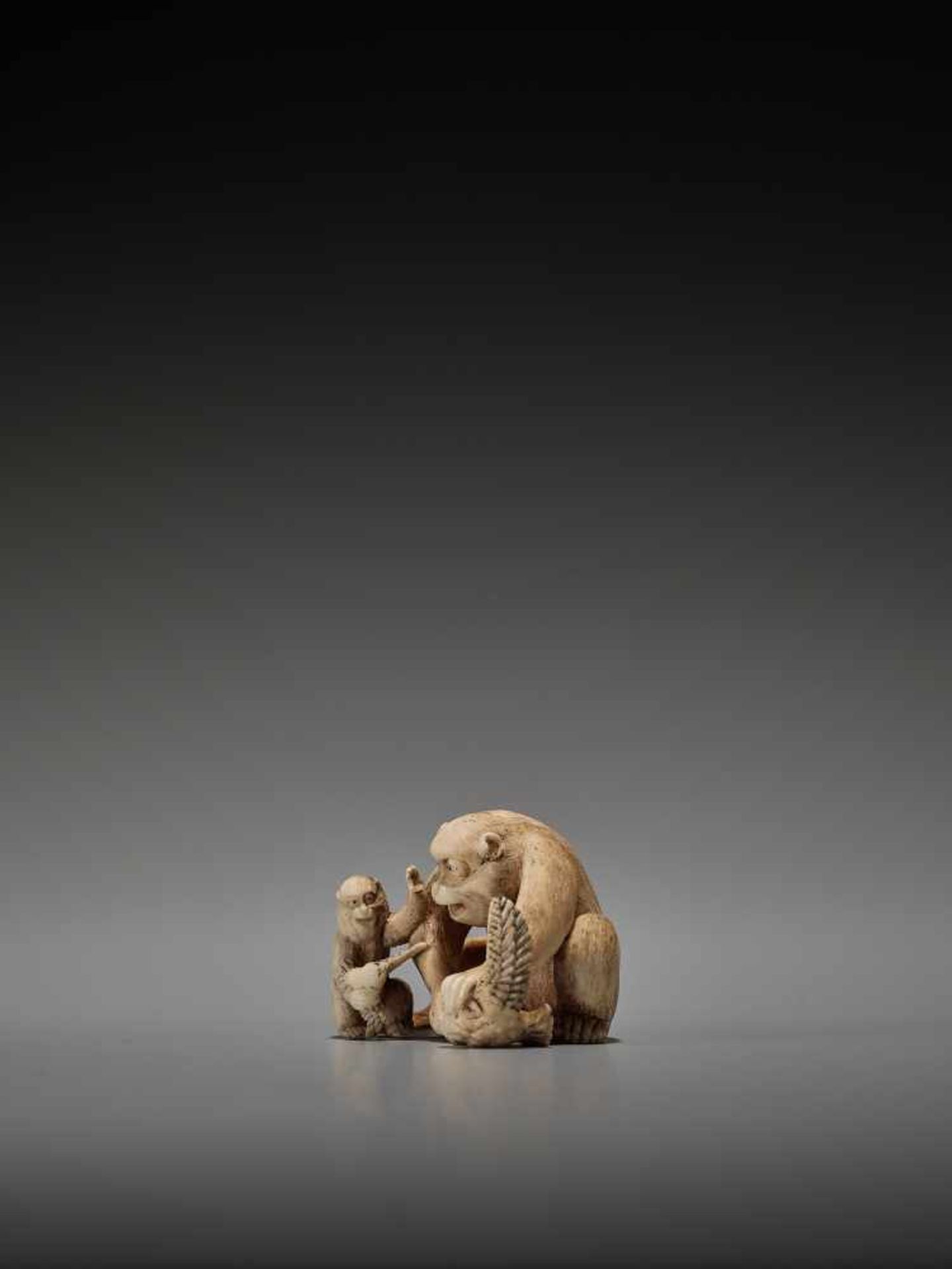 AN IVORY NETSUKE OF A MONKEY TEACHING HIS YOUNG BY SEIGYOKUBy Seigyoku, ivory netsukeJapan, late - Image 3 of 9