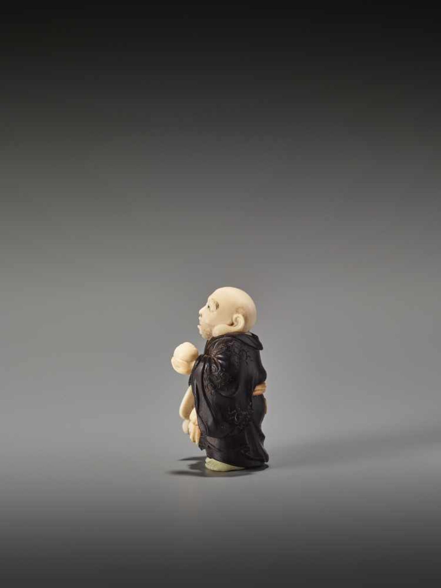 A FINE TOKYO SCHOOL EBONY AND IVORY NETSUKE OF HOTEI BY TOYOSAIBy Toyosai, ebony wood and ivory - Image 4 of 9