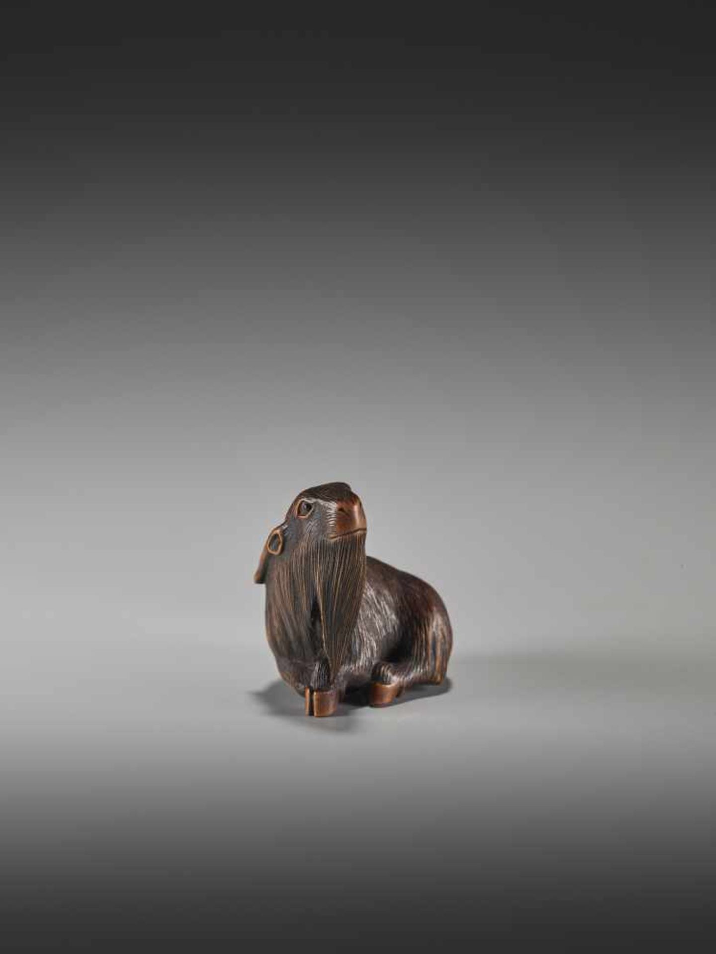 A WOOD NETSUKE OF A GOAT BY MASANAOBy Masanao, wood netsukeJapan, Ise-Yamada, 19th century, Edo - Image 3 of 10