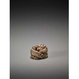 A KYOTO-SCHOOL IVORY NETSUKE OF A COILED DRAGONUnsigned, ivory netsukeJapan, Kyoto, late 18th to