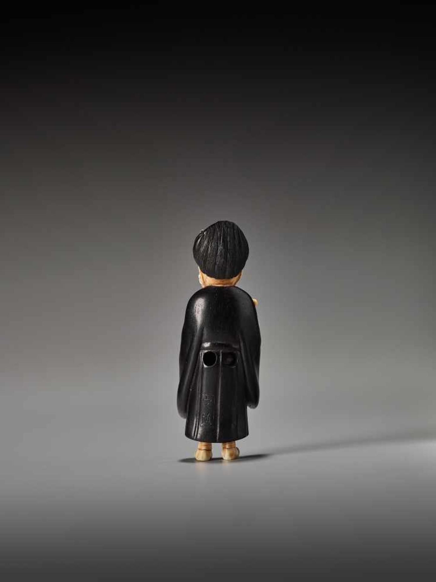 A RARE TOKYO SCHOOL EBONY AND IVORY NETSUKE OF ONI NEMBUTSU BY SADAYUKIBy Sadayuki, ebony wood and - Image 4 of 9