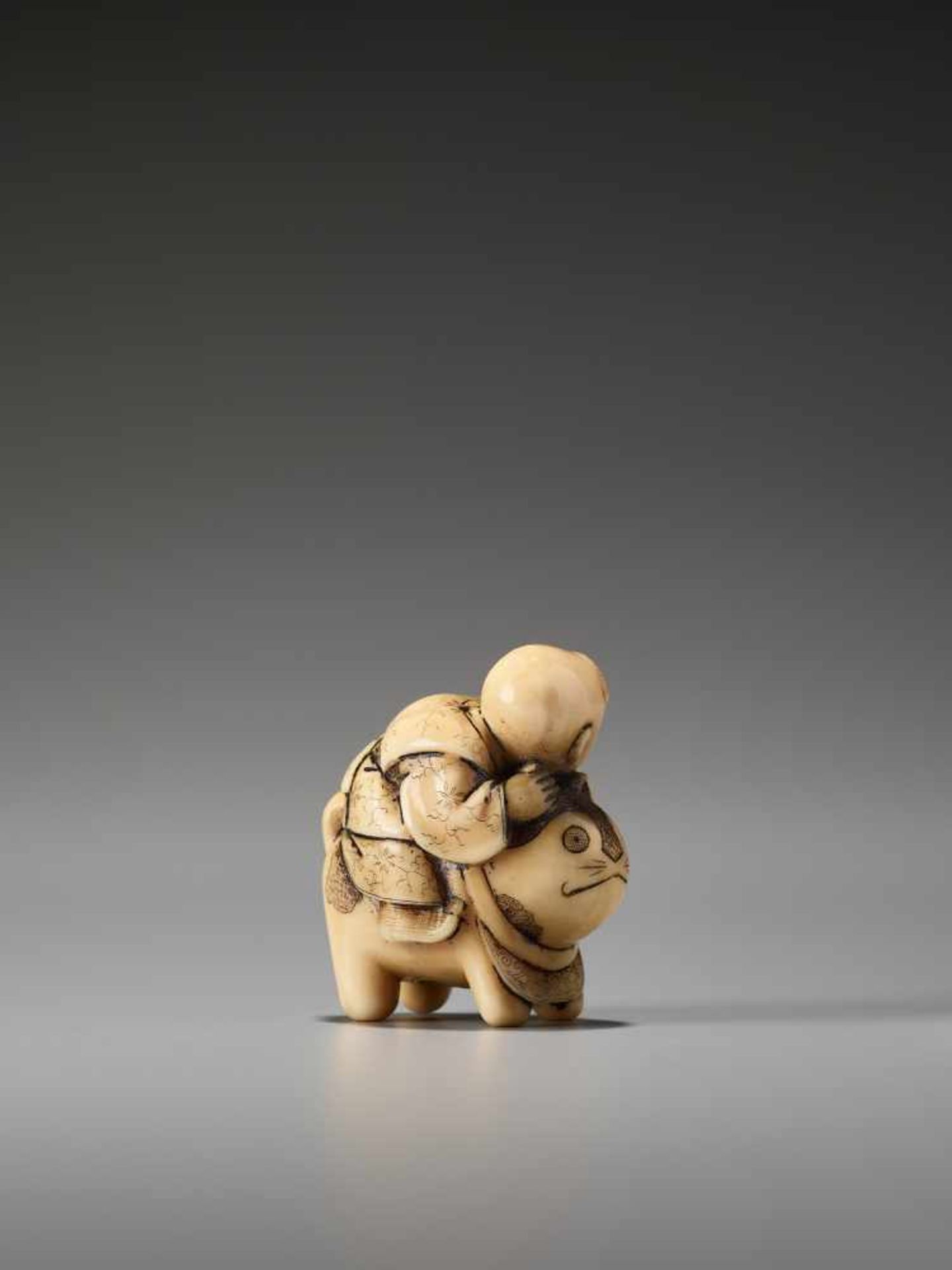 A CHARMING IVORY NETSUKE OF A BOY RIDING A CATUnsigned, ivory netsukeJapan, late 19th century, Meiji - Image 4 of 6