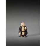 A FINE TOKYO SCHOOL EBONY AND IVORY NETSUKE OF HOTEI BY TOYOSAIBy Toyosai, ebony wood and ivory