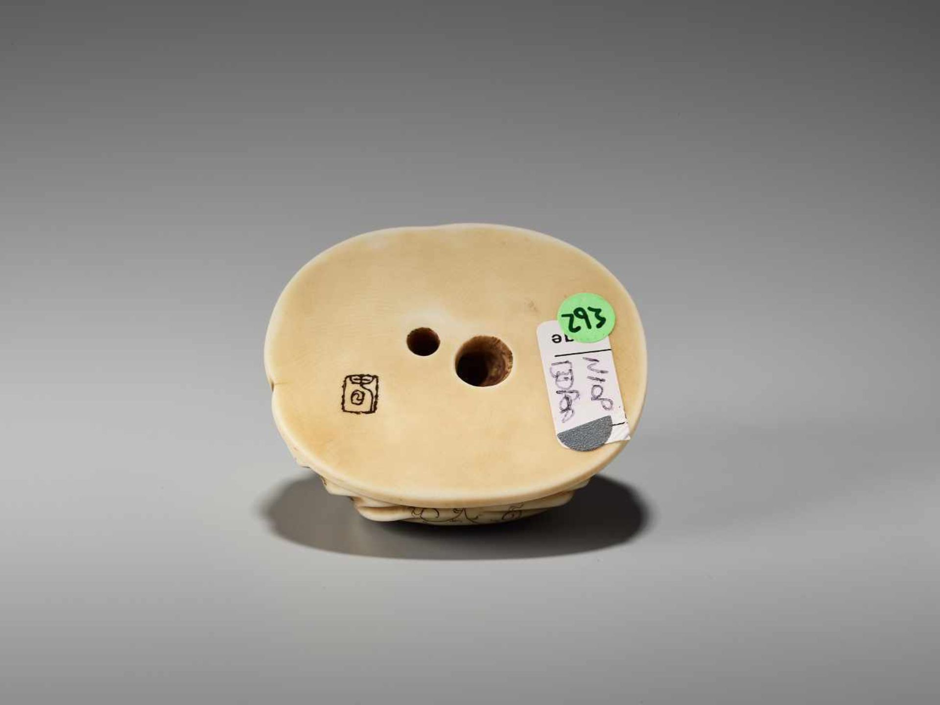 AN IVORY NETSUKE OKIMONO OF A BOY IN HOTEI’S BAGSigned in seal form Tanaka, ivory netsuke- - Image 7 of 8