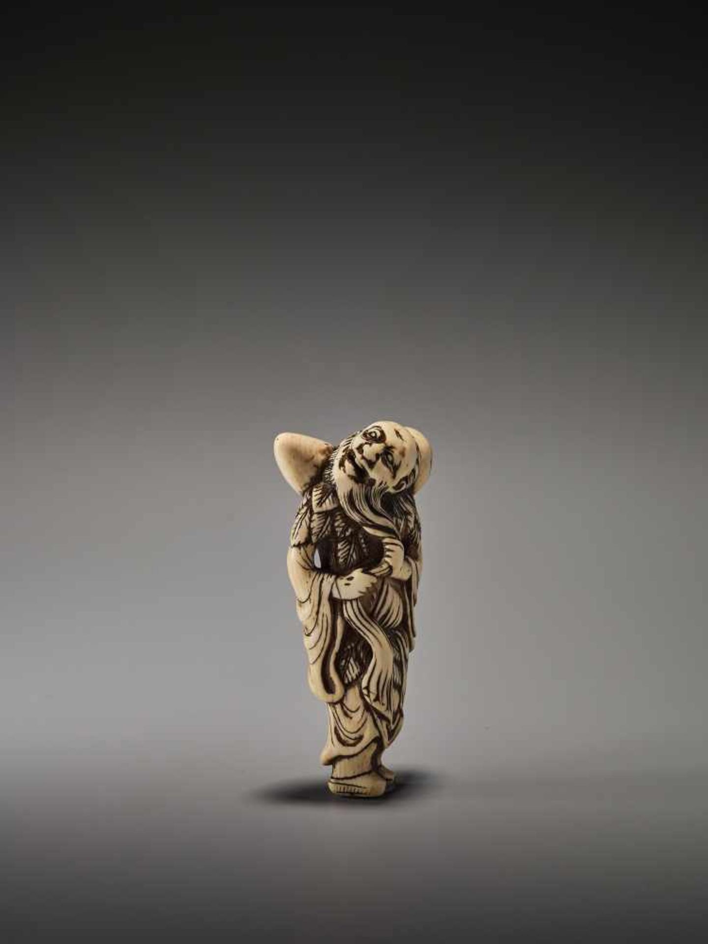 A TALL IVORY NETSUKE OF CHOKARO SENNINUnsigned, ivory netsukeJapan, 18th century, Edo period (1615-