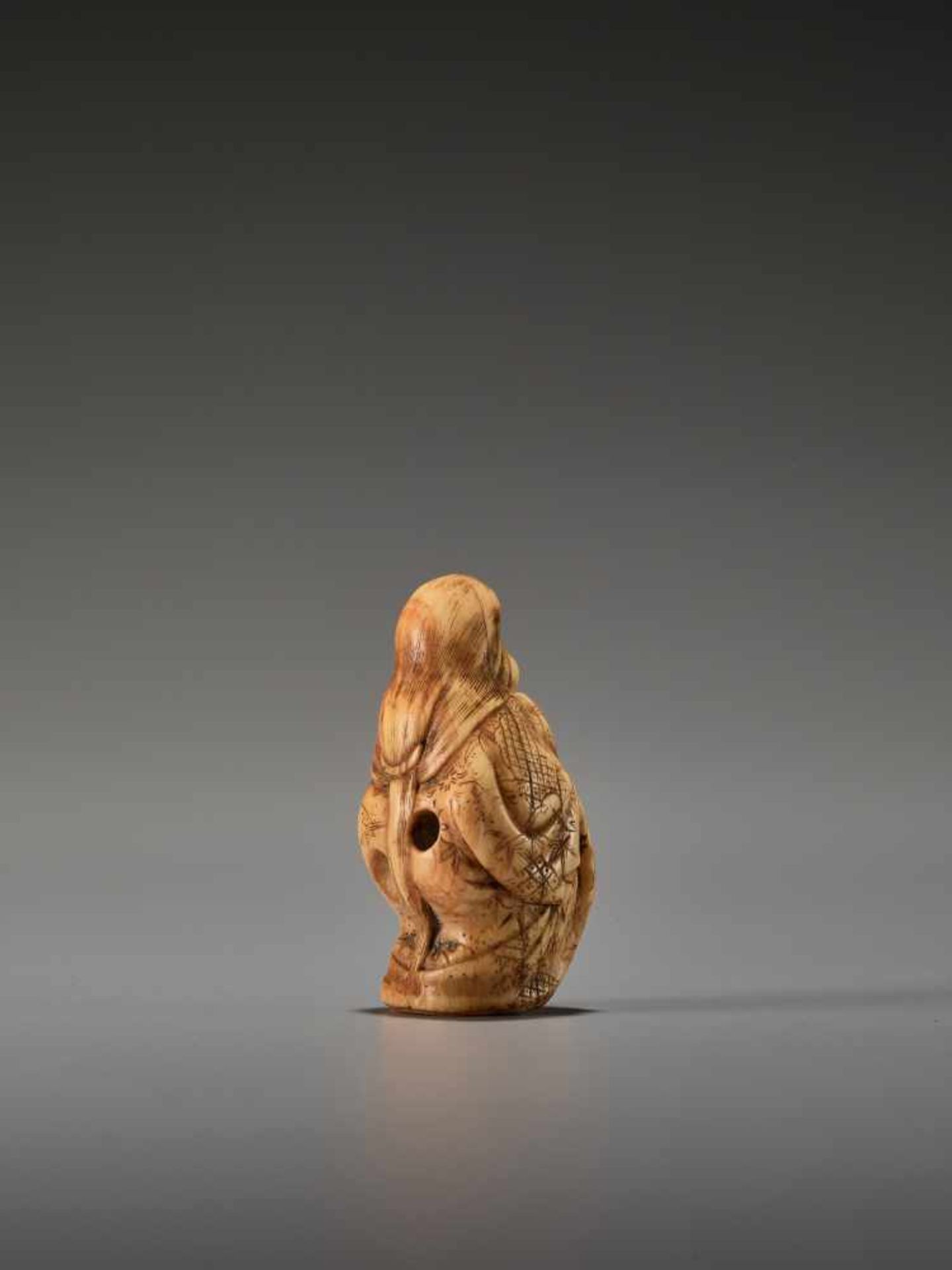 A FINE IVORY NETSUKE OF OKAME LAUGHINGUnsigned, ivory netsukeJapan, late 18th to early 19th century, - Image 5 of 7