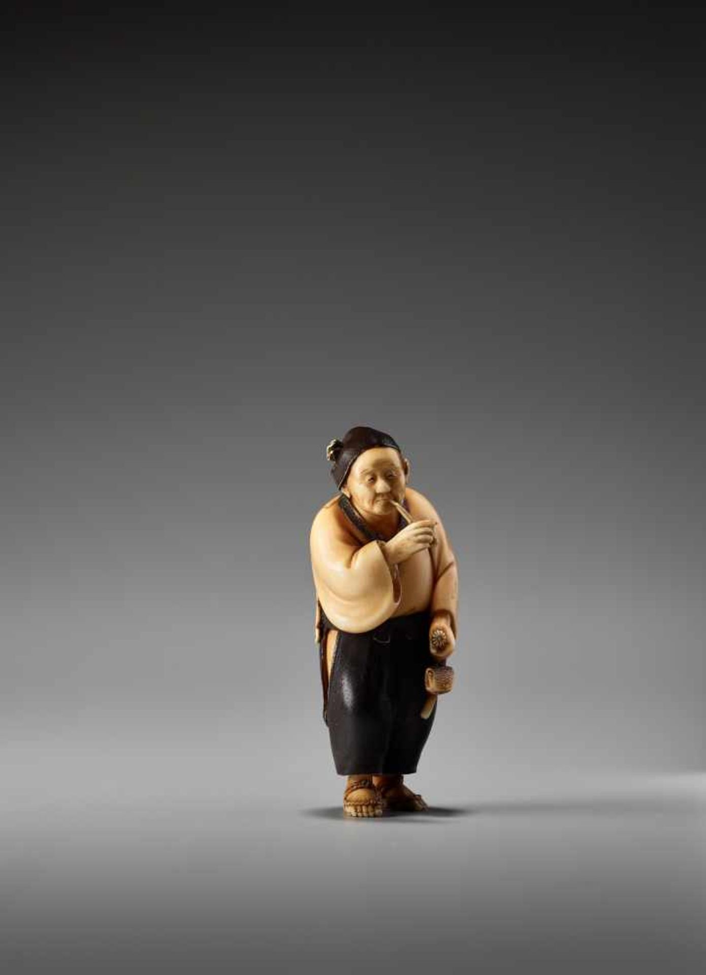 A SO SCHOOL IVORY NETSUKE OF A MAN SMOKING A PIPE BY SOSAIBy Sosai, ivory netsuke with lacquerJapan, - Image 6 of 11