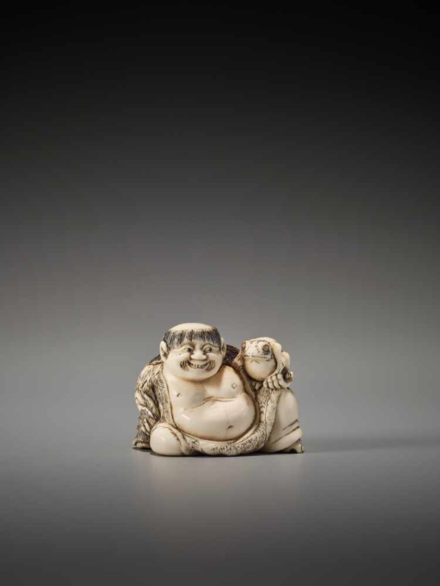 A GOOD IVORY NETSUKE OF GAMA SENNIN ATTRIBUTED TO YOSHINAGAUnsigned, attributed to Yoshinaga,