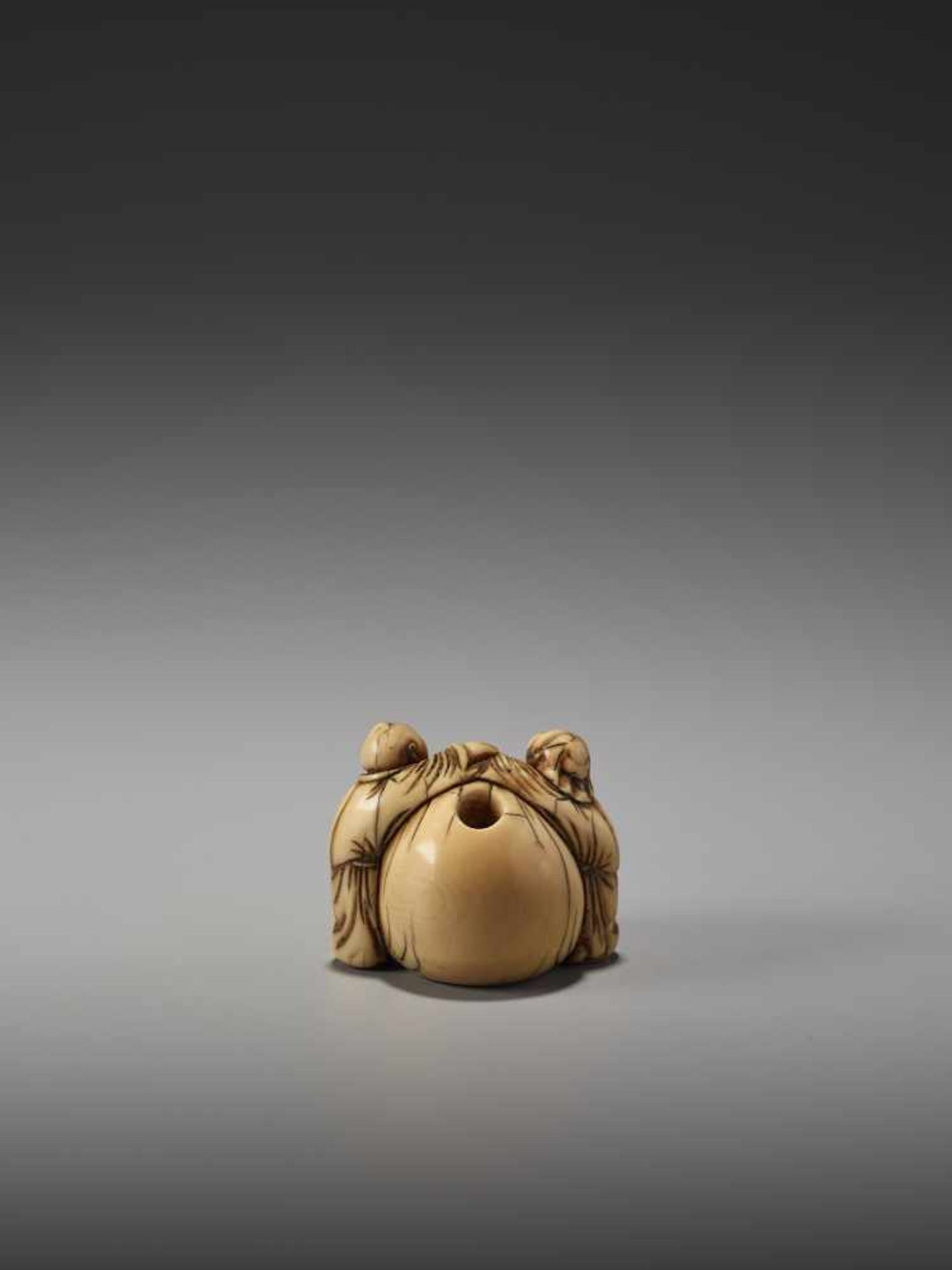 AN EARLY IVORY NETSUKE OF TWO CHINESE BOYS AND THE BAG OF HOTEIUnsigned, ivory netsukeJapan, mid- - Image 3 of 5