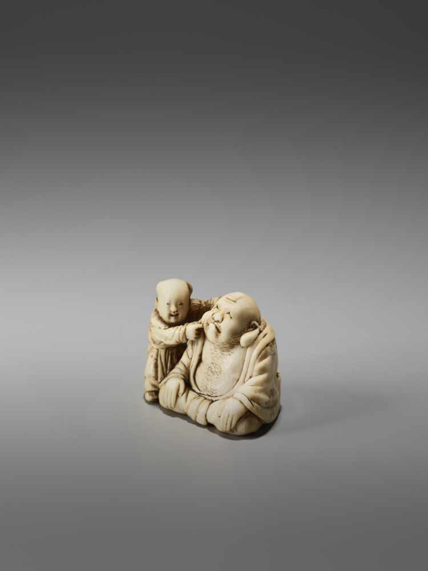 AN IVORY NETSUKE OF HOTEI PLAYING KAMIFUKI AND A KARAKO BY MINZANBy Minzan, ivory netsukeJapan, - Image 3 of 7