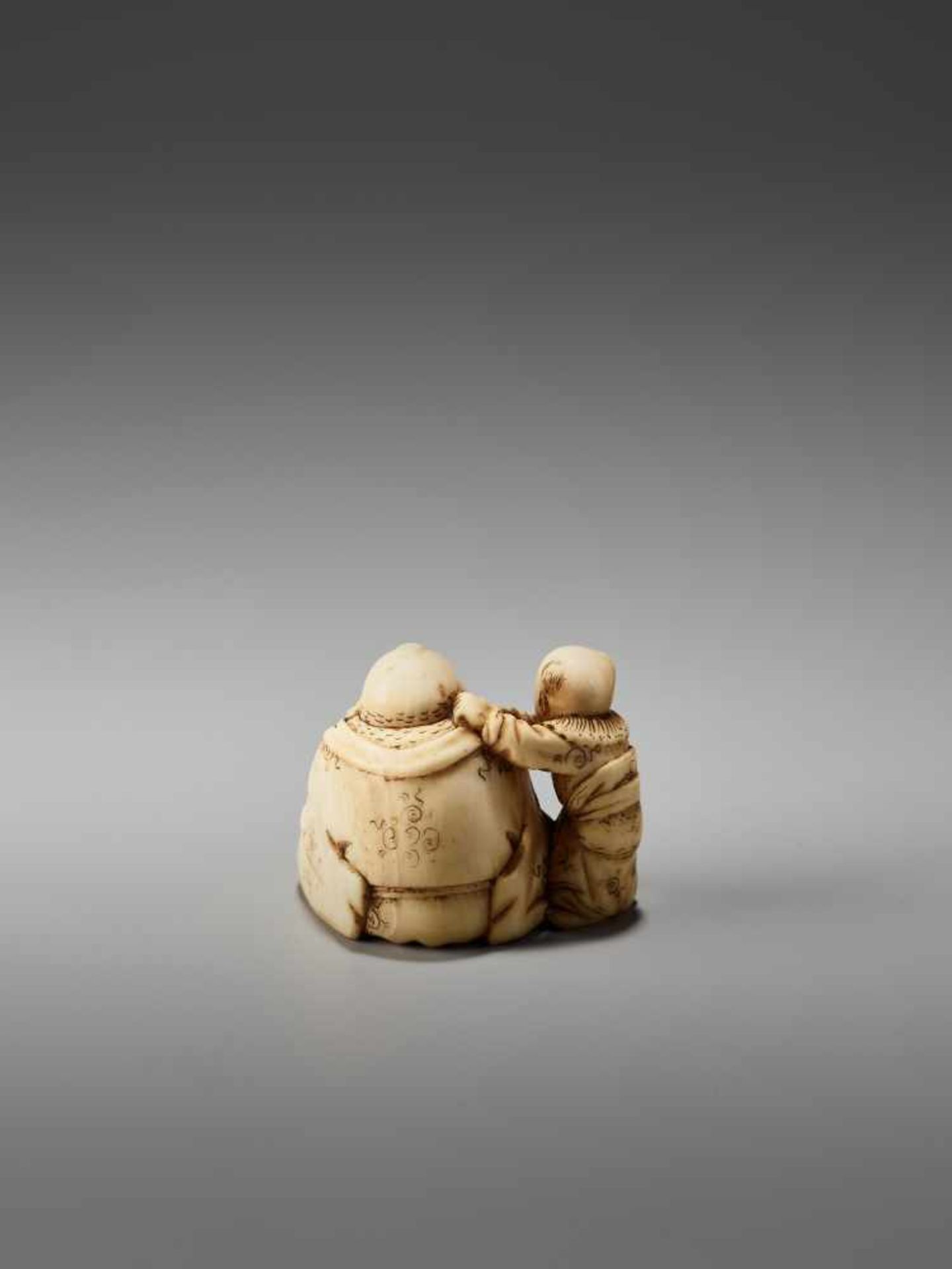 AN IVORY NETSUKE OF HOTEI PLAYING KAMIFUKI AND A KARAKO BY MINZANBy Minzan, ivory netsukeJapan, - Image 5 of 7