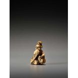 A RARE IVORY SHUNGA NETSUKE OF OKAME WITH TENGU MASK BY SHUOSAI HIDEMASABy Shuosai (Hidemasa), ivory