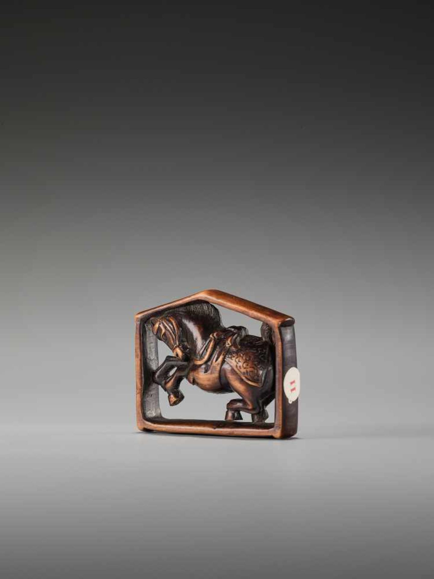 AN UNUSUAL WOOD NETSUKE OF A HORSE IN A WINDOWUnsigned, wood netsukeJapan, 19th century, Edo - Image 3 of 7